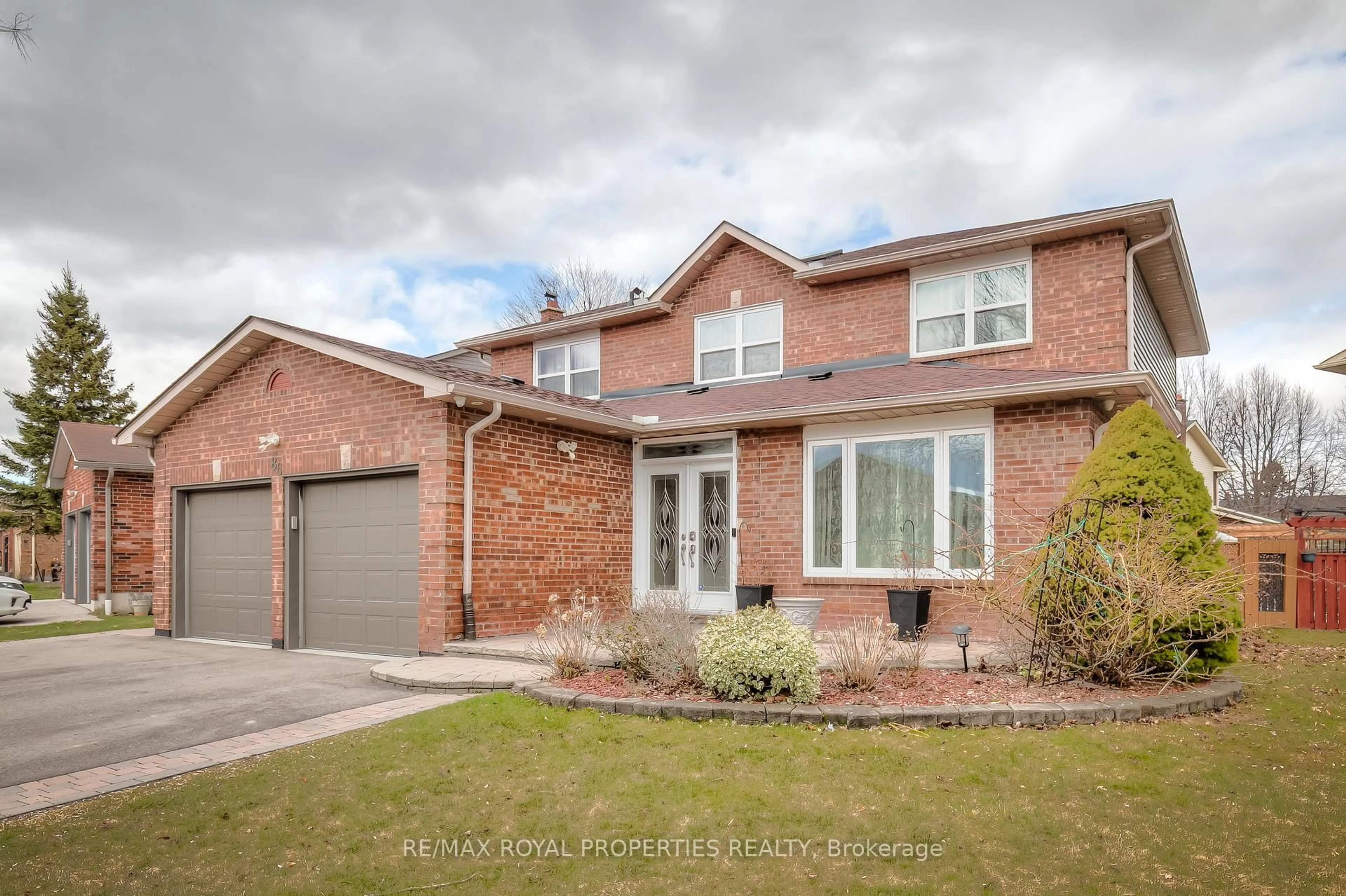 Home with brick exterior material, street for 86 Rollo Dr, Ajax Ontario L1S 7B7