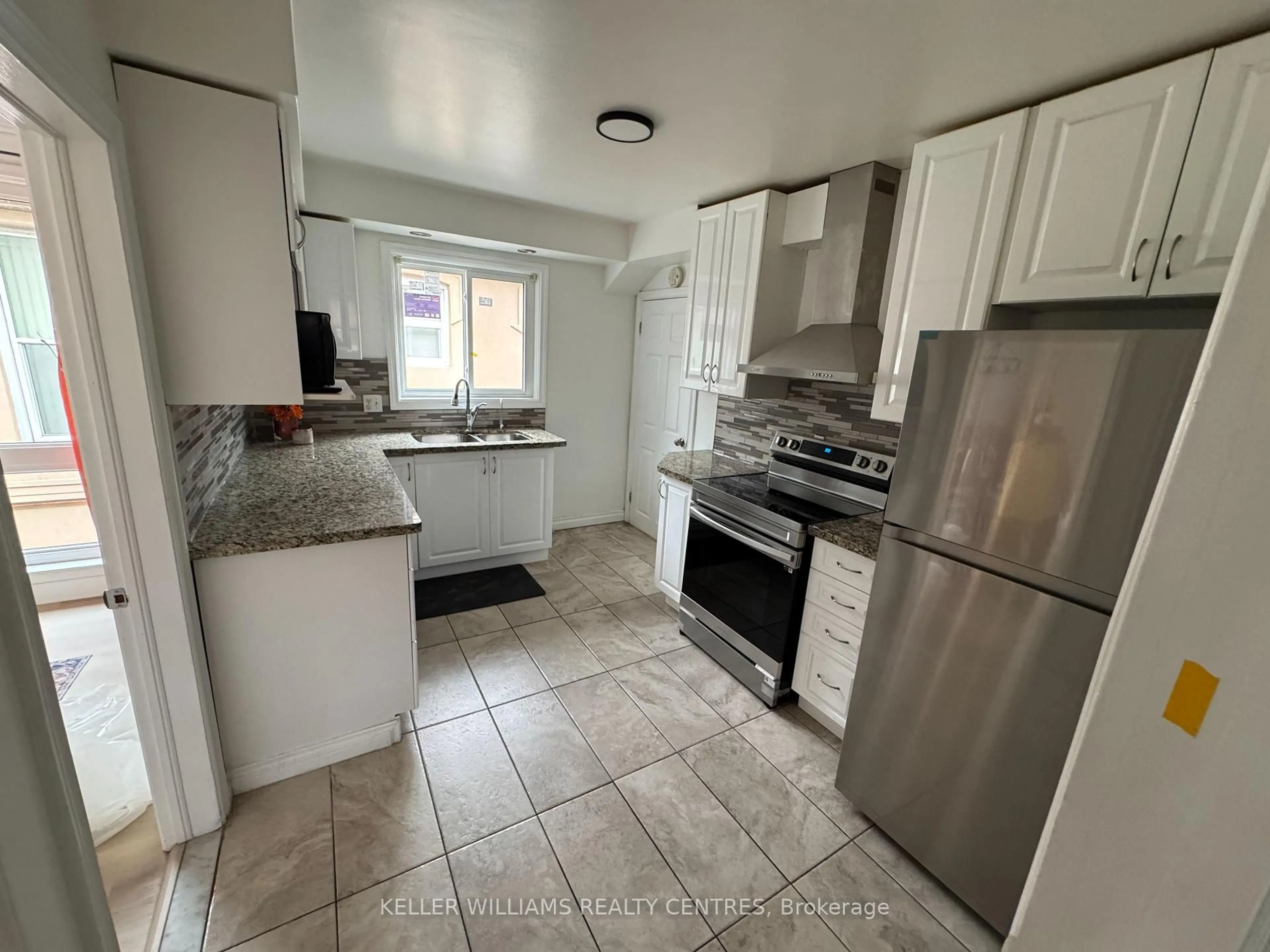 Standard kitchen, ceramic/tile floor for 1393 Birchmount Rd, Toronto Ontario M1P 2E2