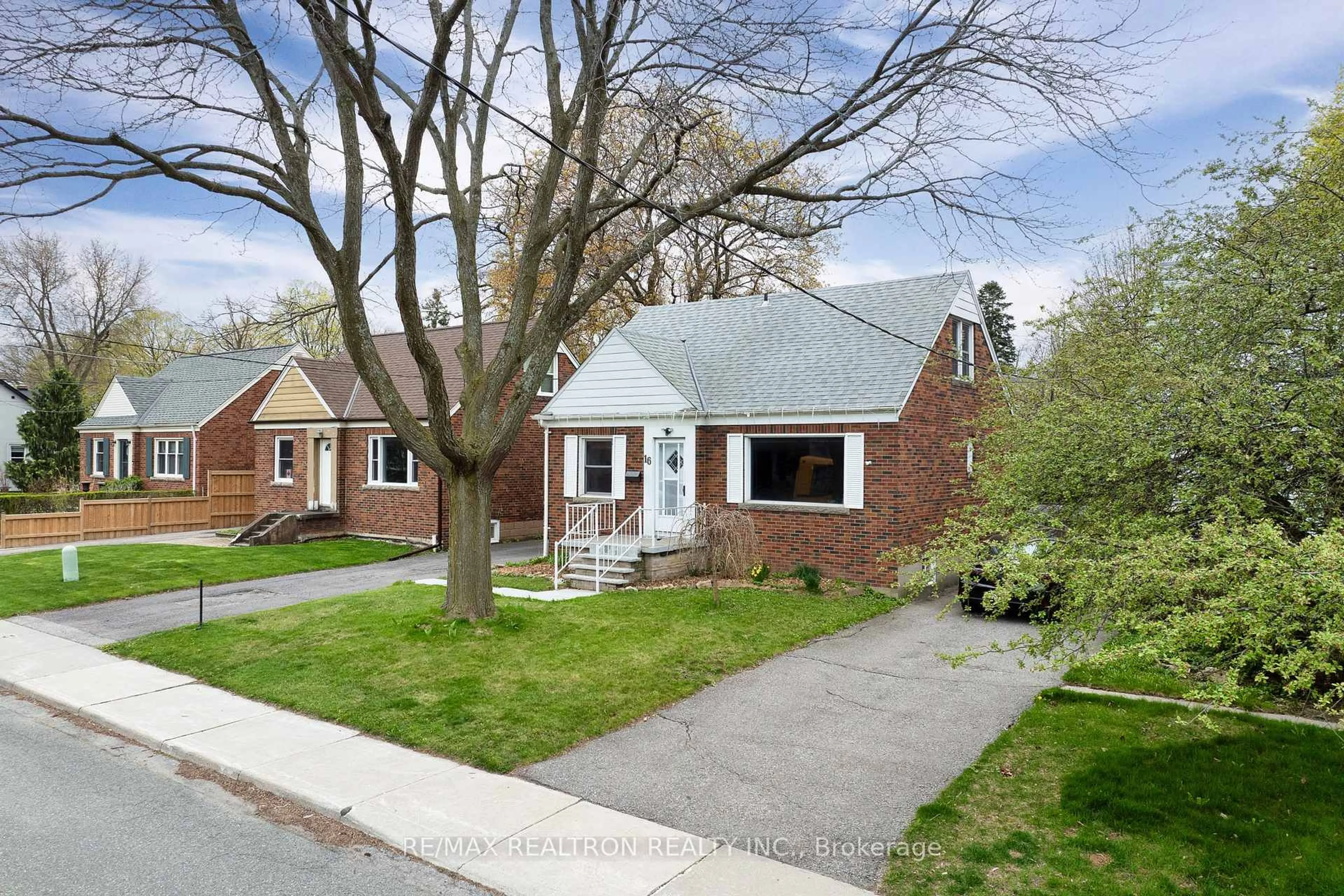 Home with brick exterior material, street for 16 Plaxton Dr, Toronto Ontario M4B 2P8