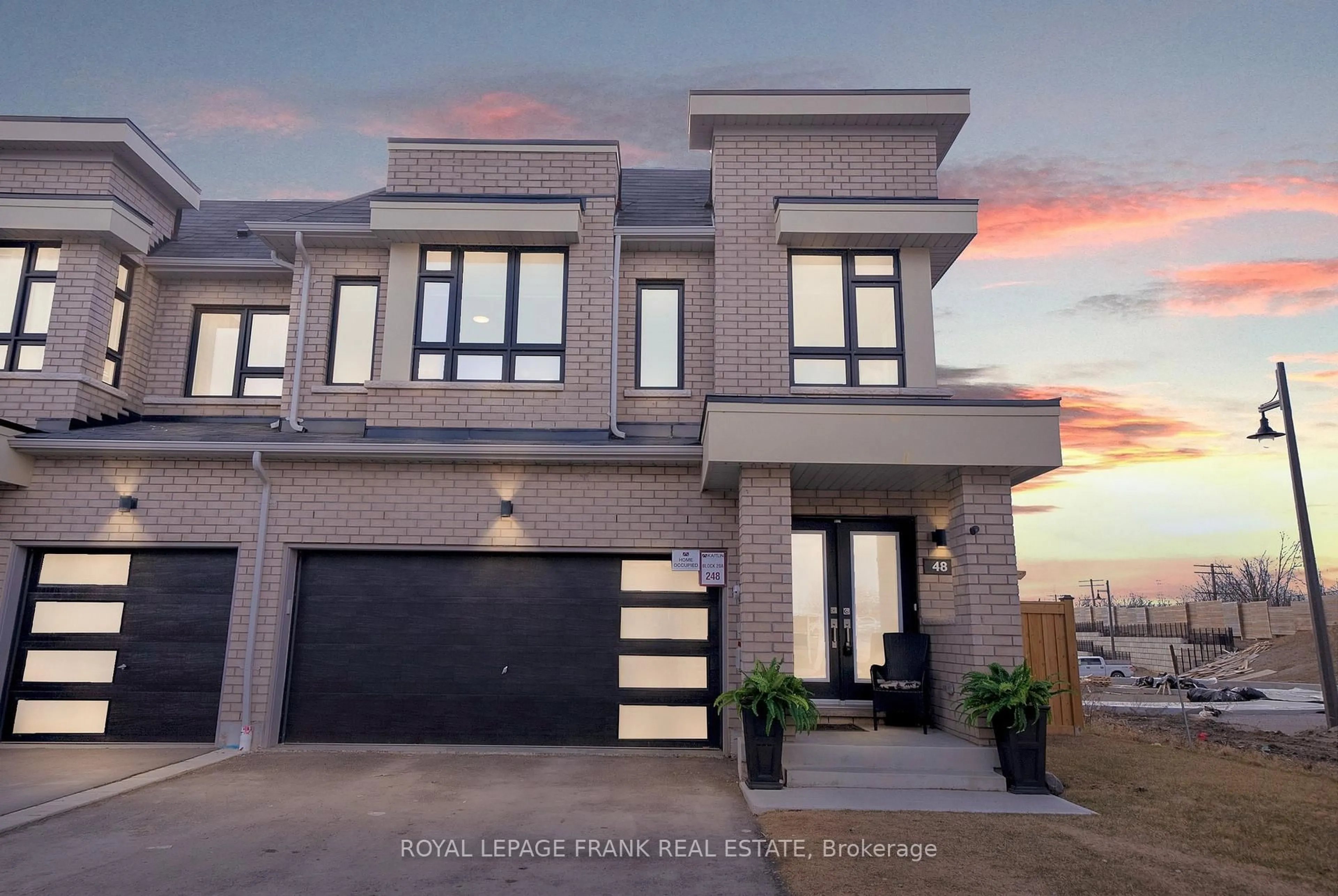 Home with brick exterior material, street for 48 Caspian Sq, Clarington Ontario L1C 7G3
