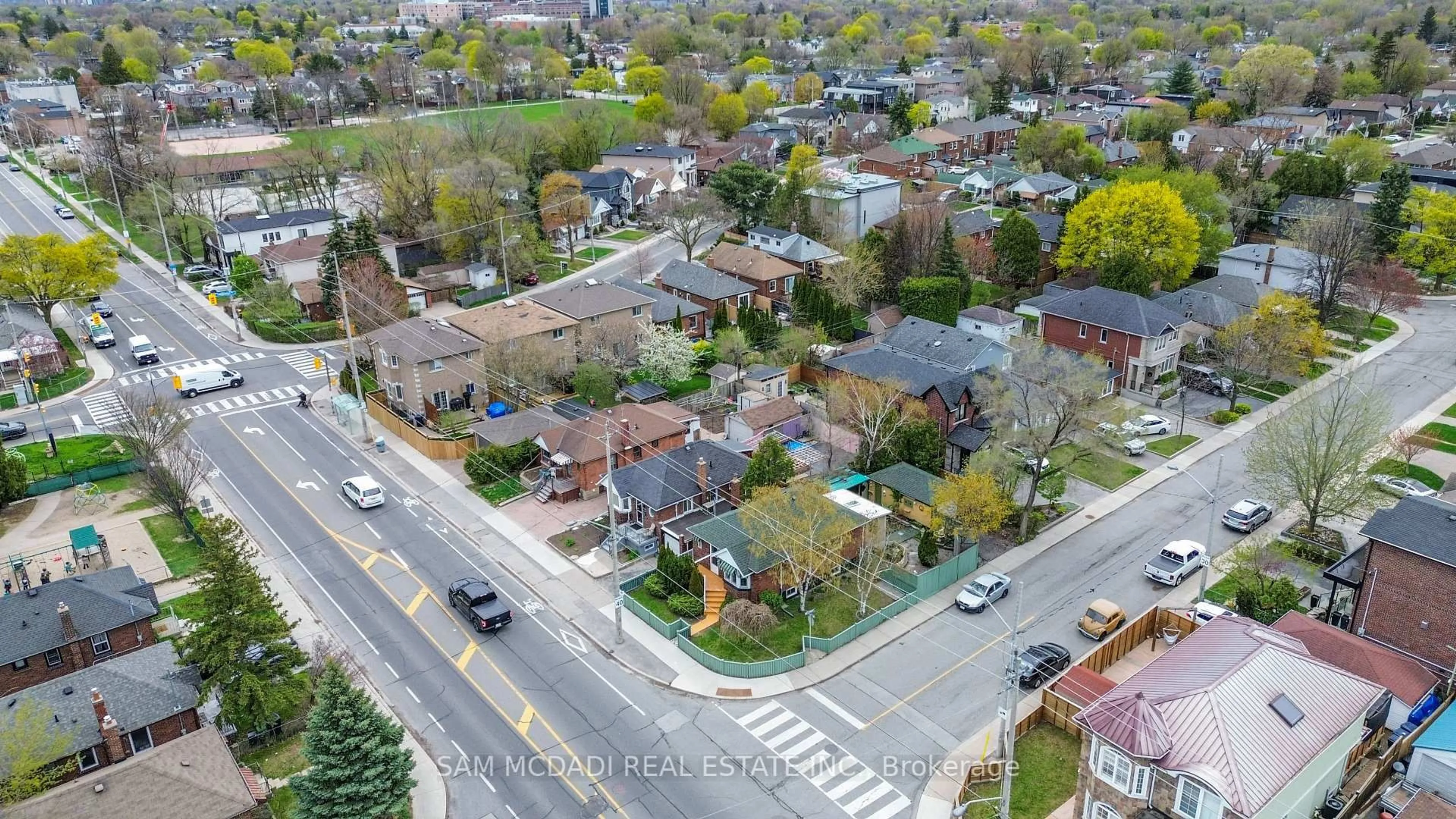 A pic from outside/outdoor area/front of a property/back of a property/a pic from drone, street for 319 Cosburn Ave, Toronto Ontario M4J 2N1