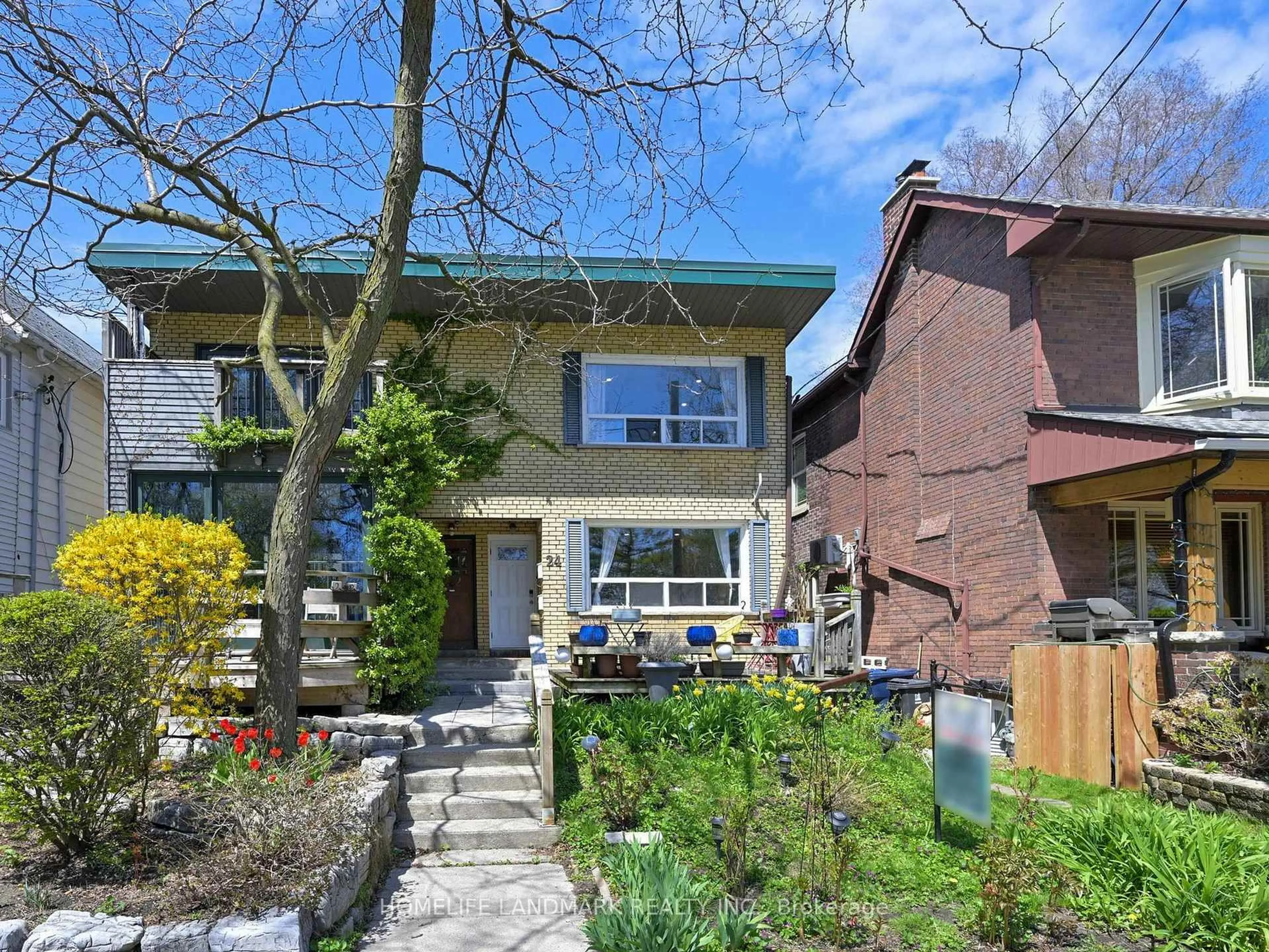 Home with brick exterior material, street for 24 Kewbeach Ave, Toronto Ontario M4L 1B7