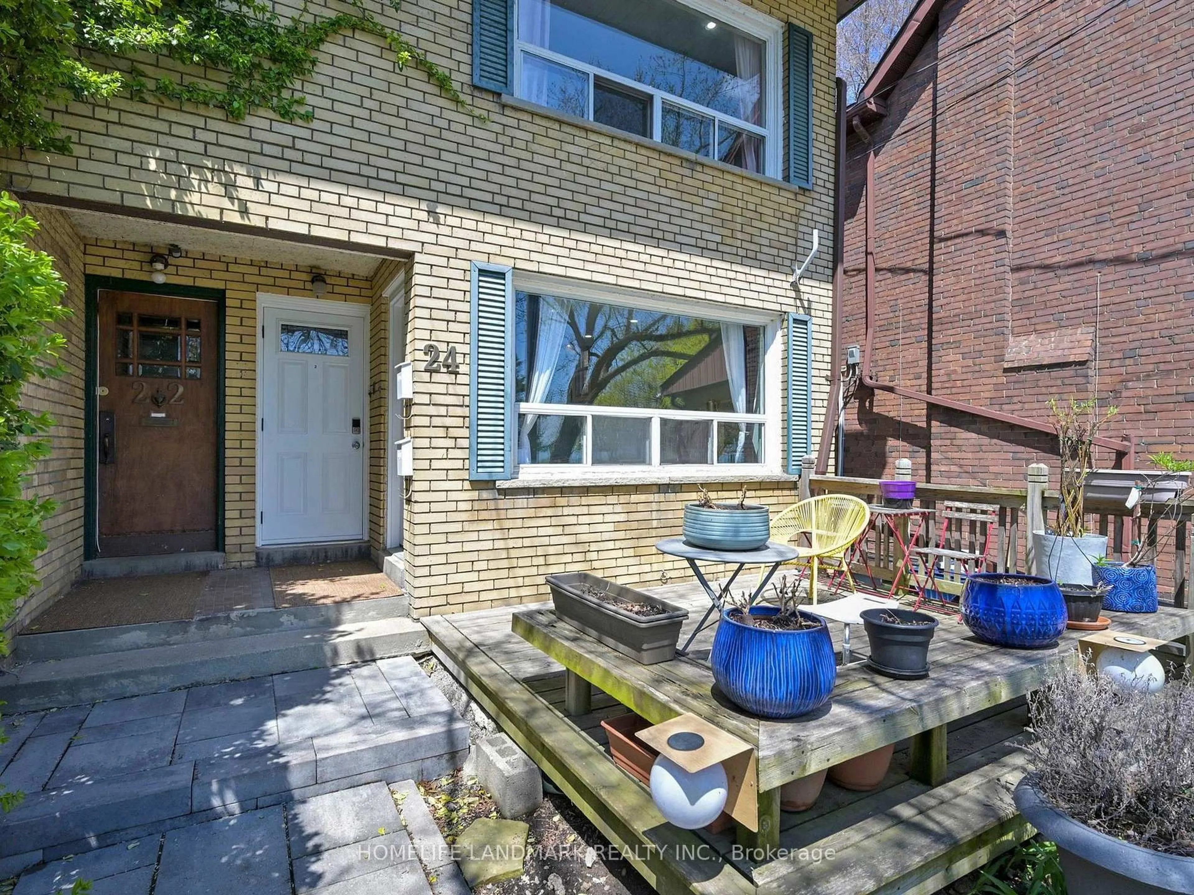 Home with brick exterior material, street for 24 Kewbeach Ave, Toronto Ontario M4L 1B7