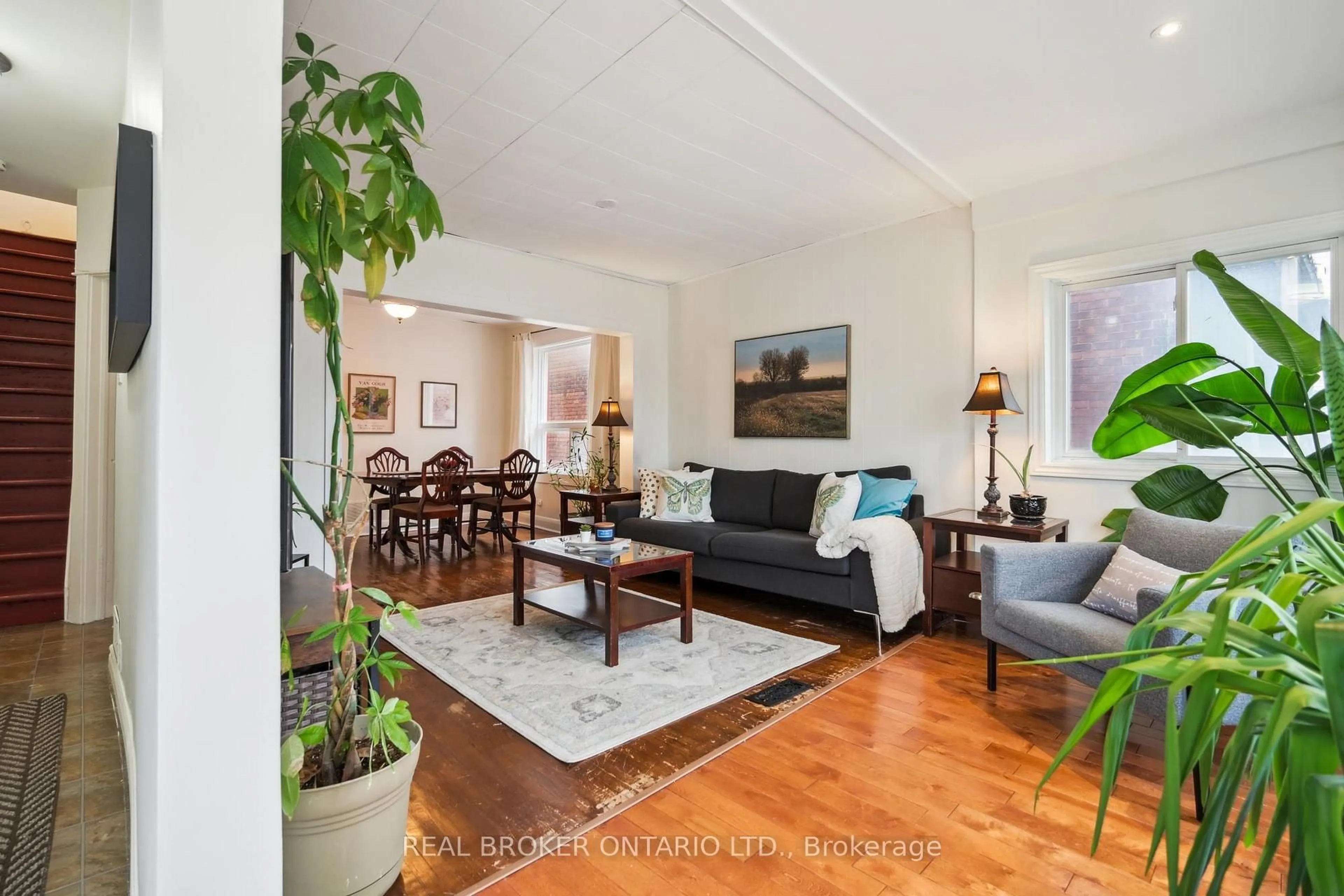 Living room with furniture, unknown for 105 Wiley Ave, Toronto Ontario M4J 3W5
