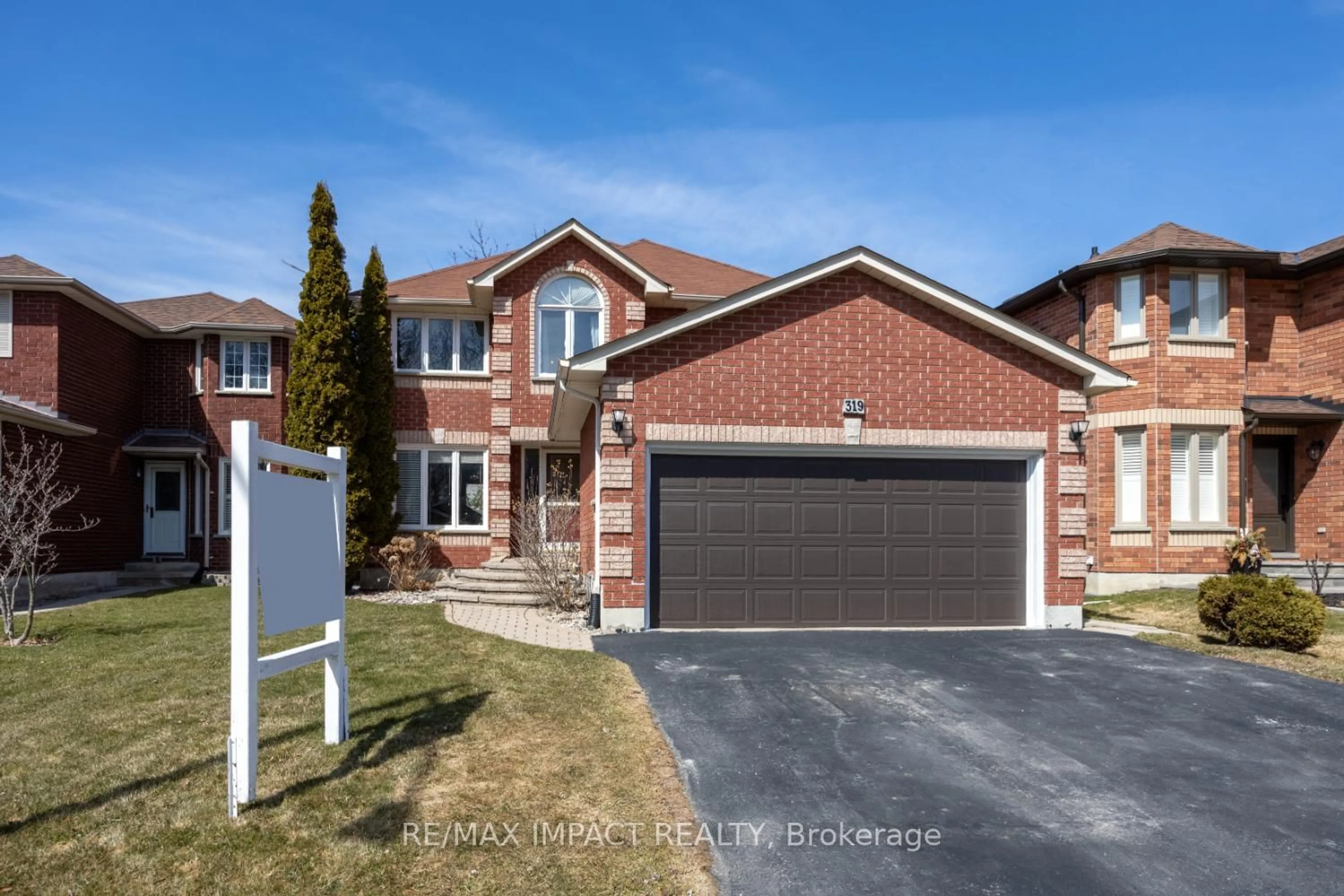 Home with brick exterior material, street for 319 Sandringham Dr, Clarington Ontario L1E 3A7