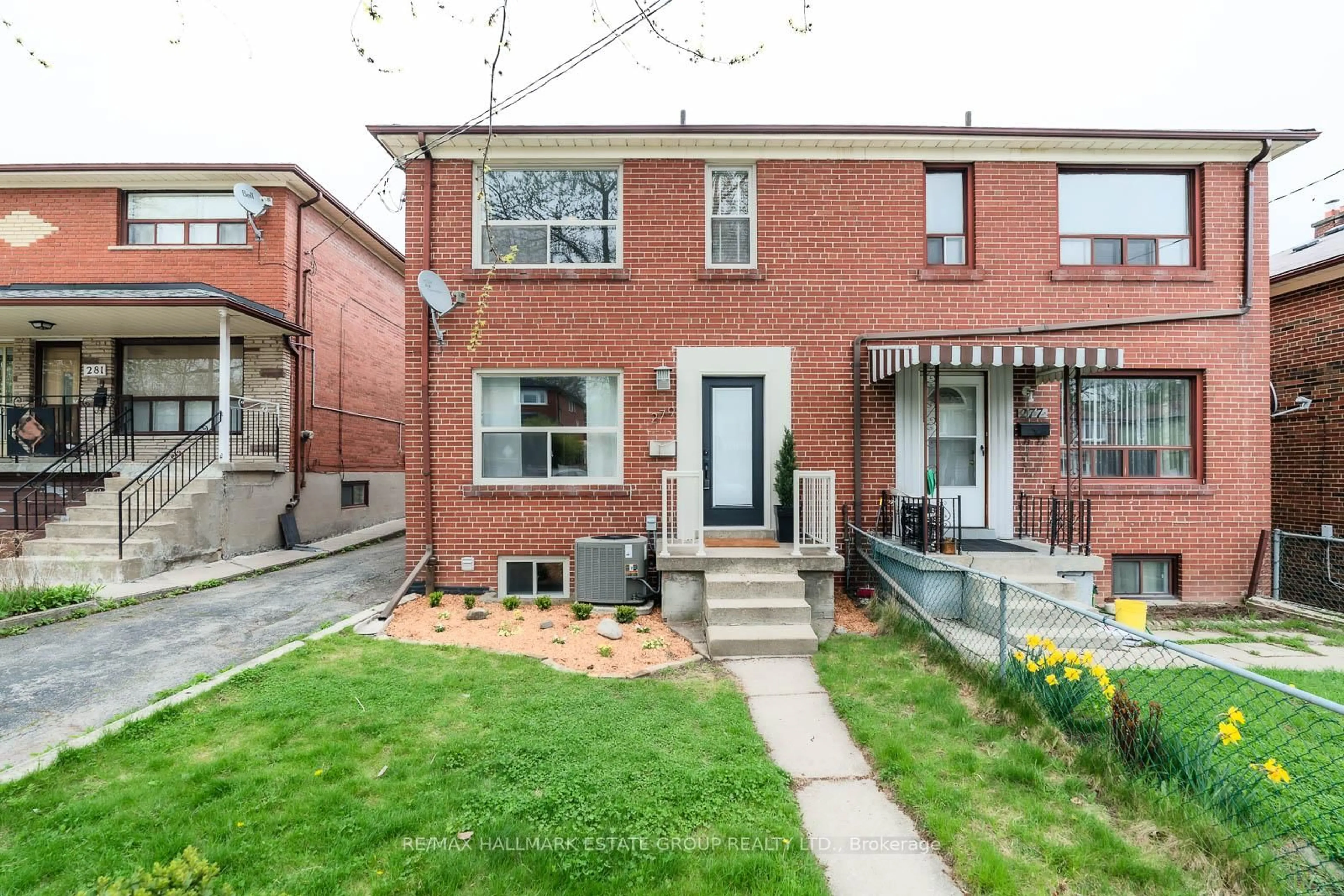 Home with brick exterior material, street for 279 Hiawatha Rd, Toronto Ontario M4L 2Y3
