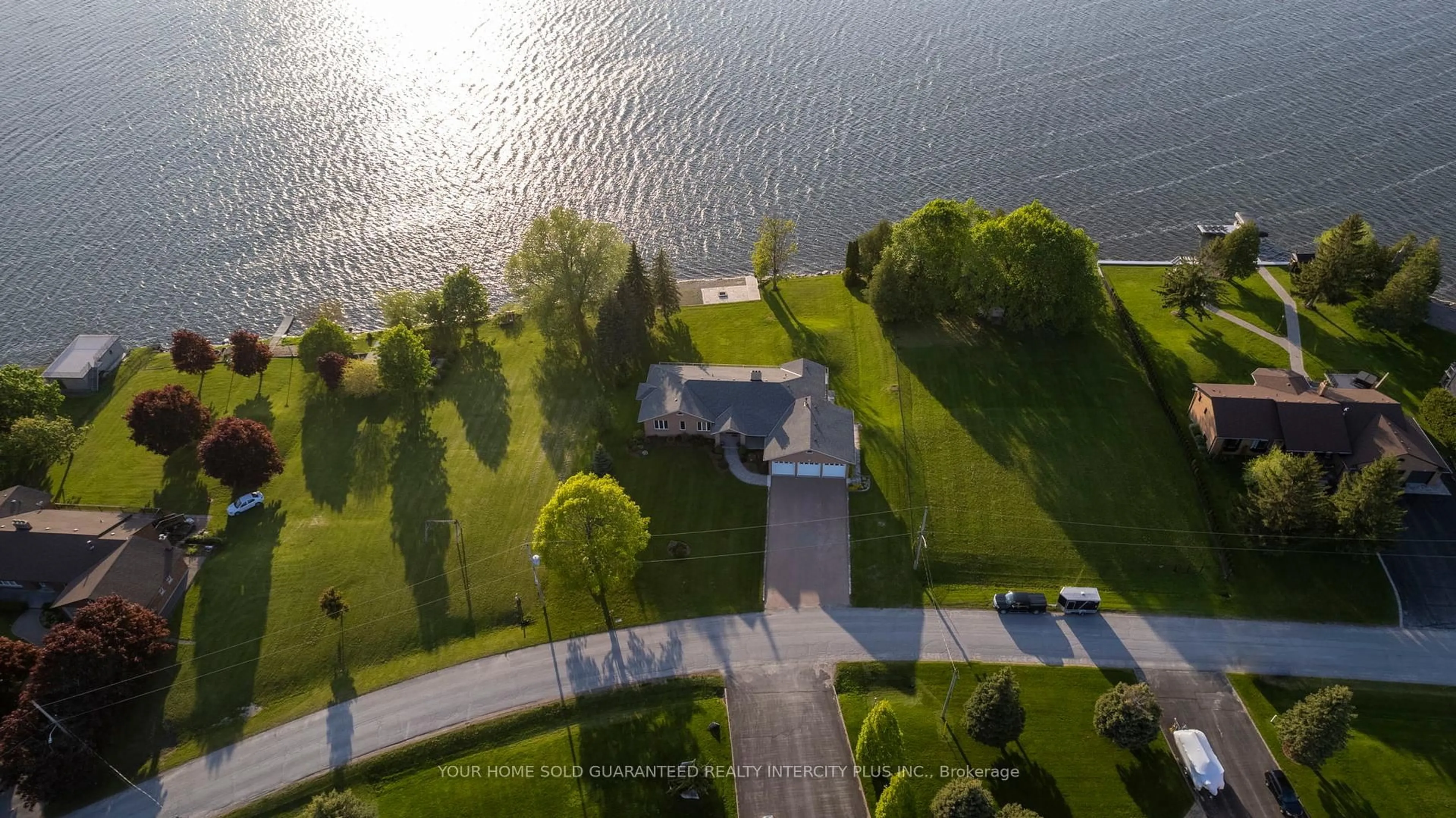 A pic from outside/outdoor area/front of a property/back of a property/a pic from drone, water/lake/river/ocean view for 592 Fralicks Beach Rd, Scugog Ontario L9L 1B6