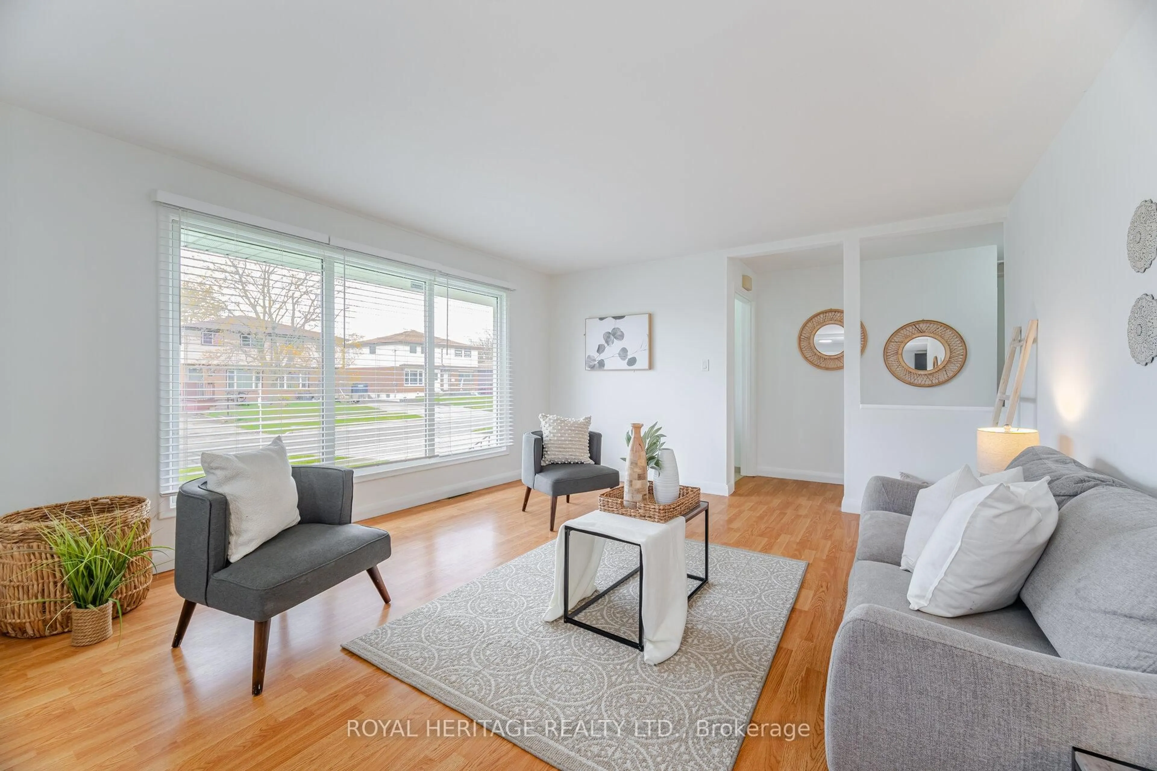 Living room with furniture, wood/laminate floor for 283 Porter St, Oshawa Ontario L1J 1N3