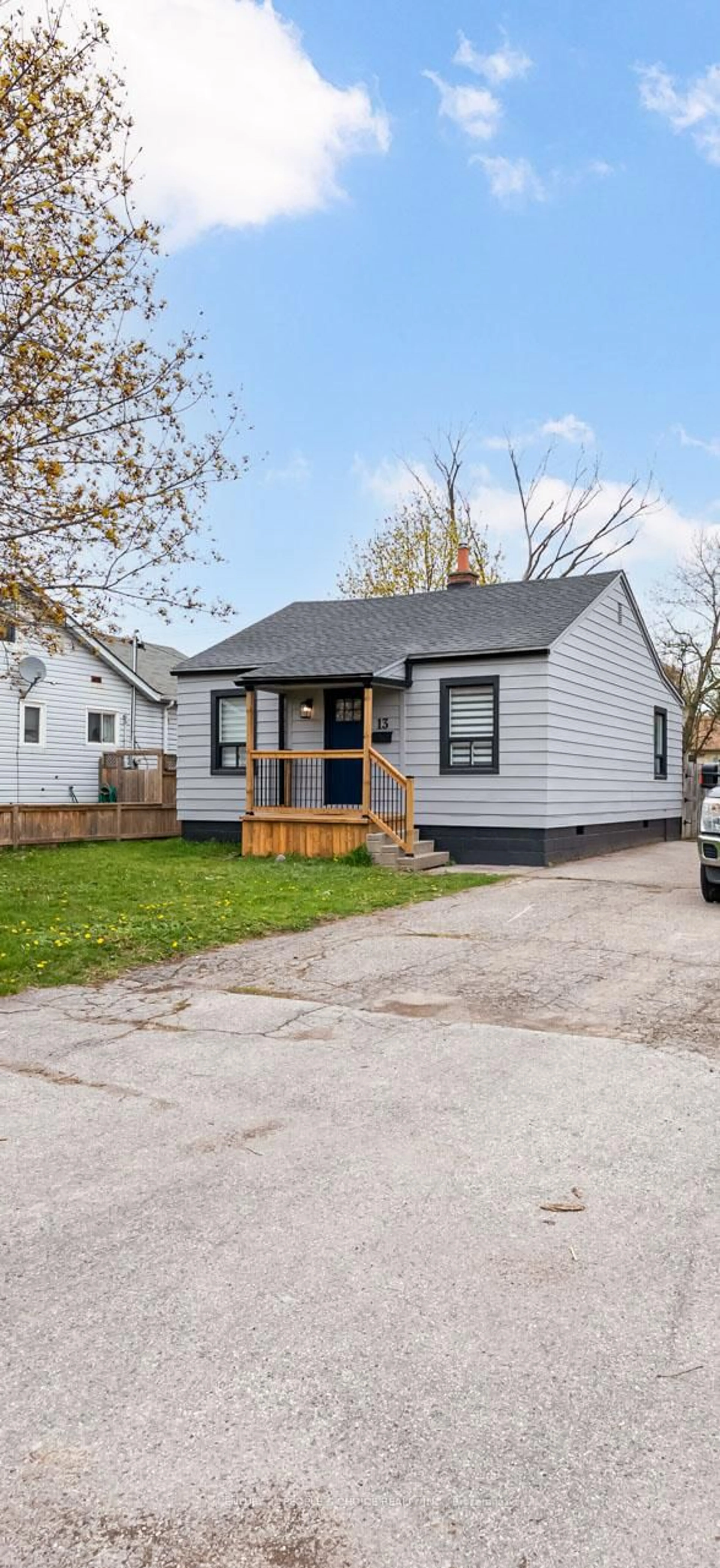 Home with vinyl exterior material, street for 13 Tudor Ave, Ajax Ontario L1S 1Z9