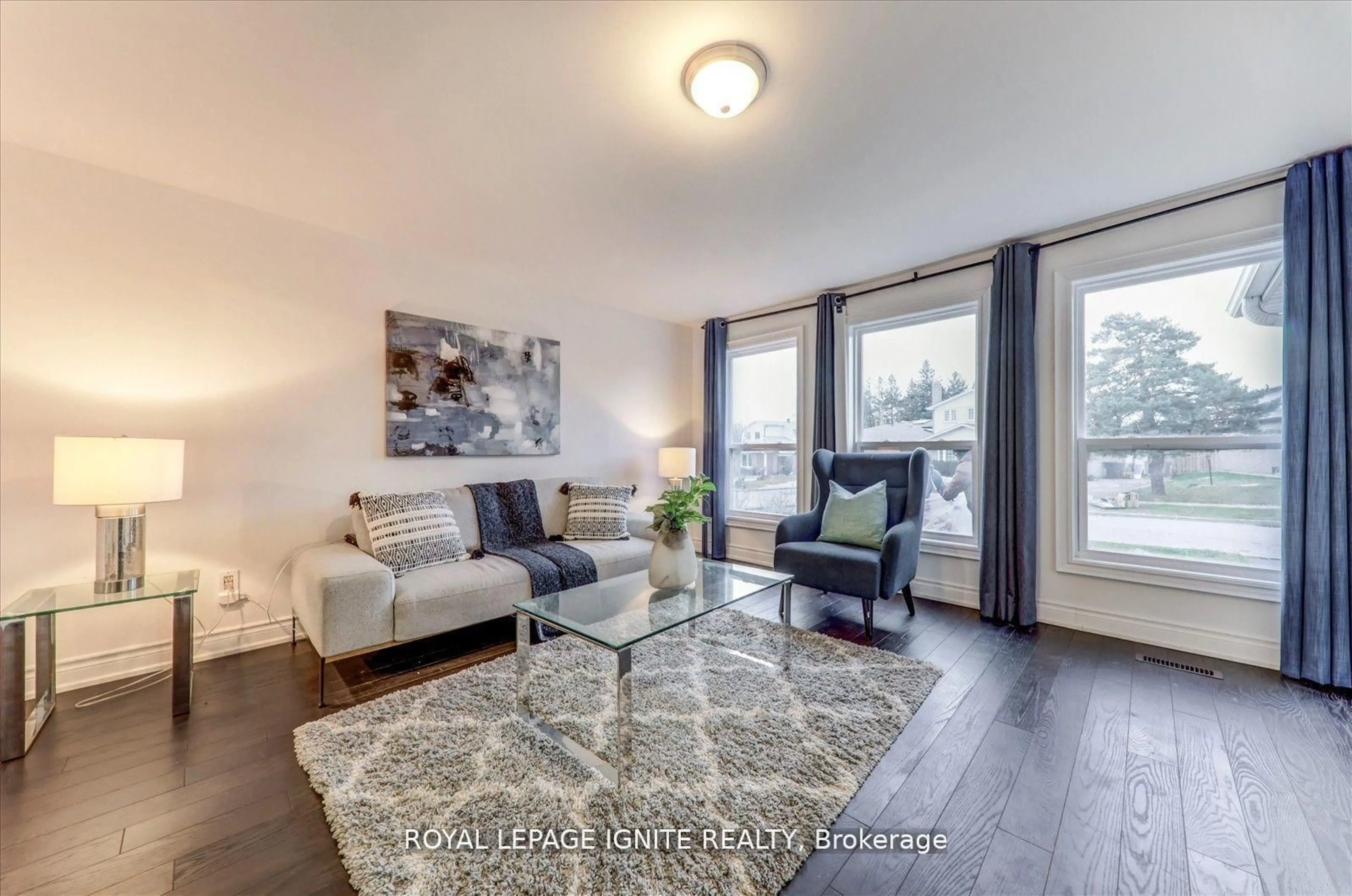 Living room with furniture, wood/laminate floor for 50 Bridley Dr, Toronto Ontario M1V 1A9