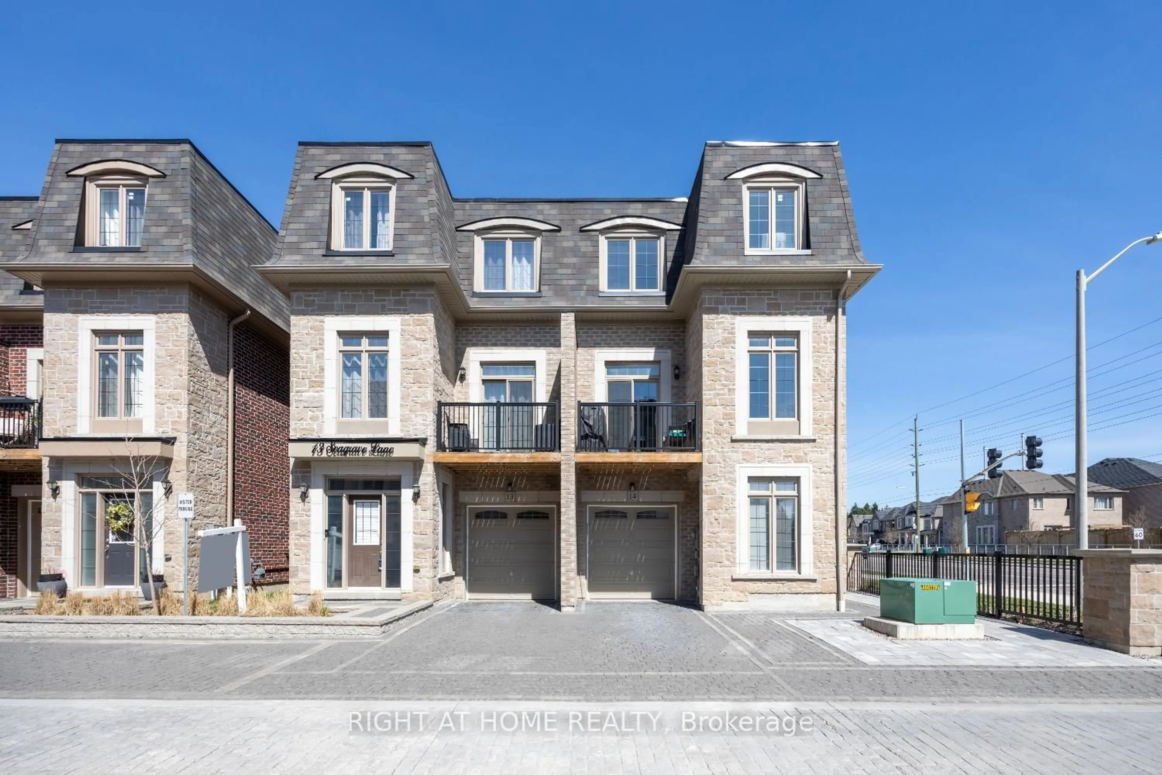 Home with brick exterior material, street for 14 Seagrave Lane, Ajax Ontario L1T 0P2