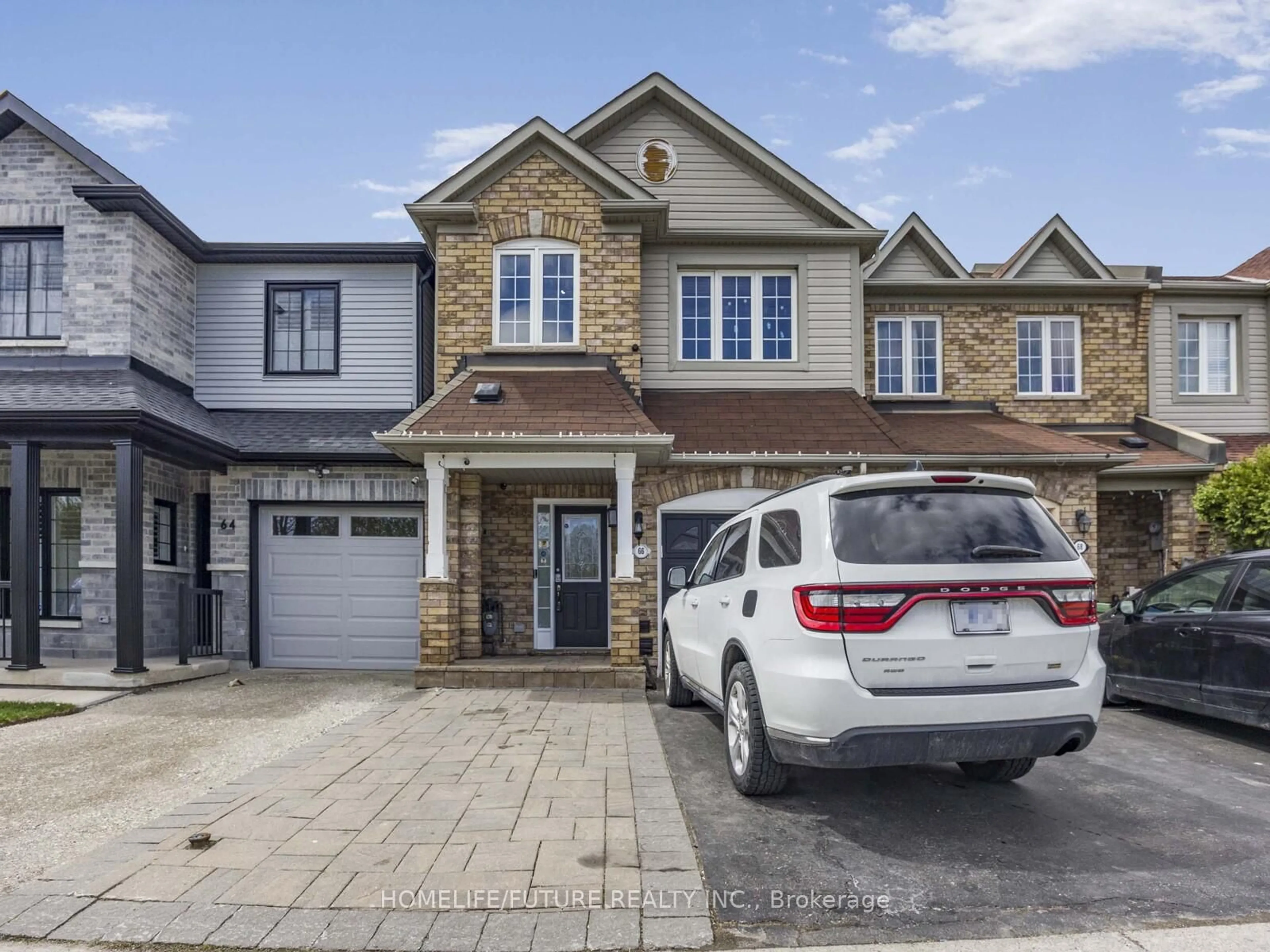 Home with brick exterior material, street for 66 Gristone Cres, Toronto Ontario M1X 1V1