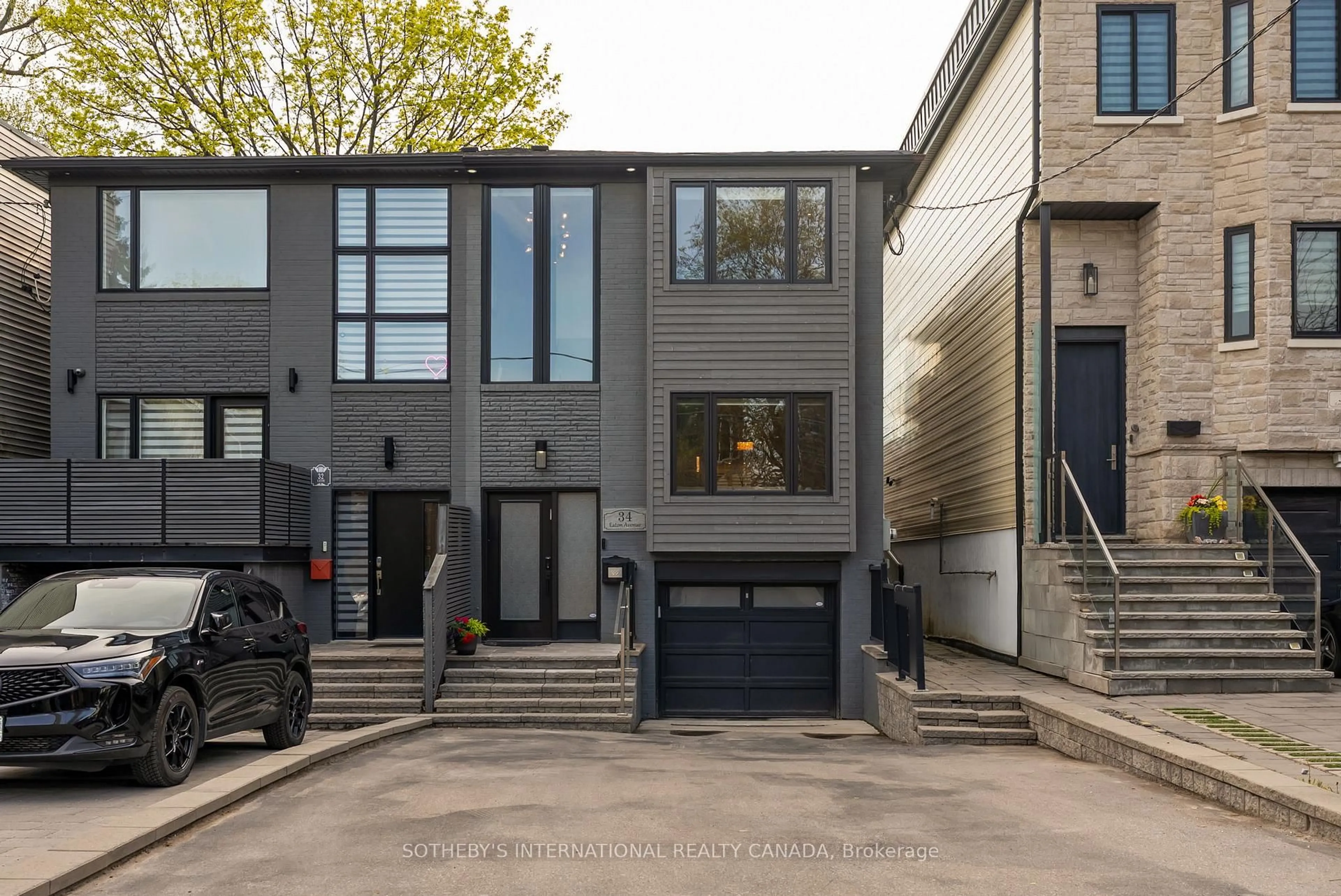 Home with brick exterior material, street for 34 Eaton Ave, Toronto Ontario M4J 2Z5