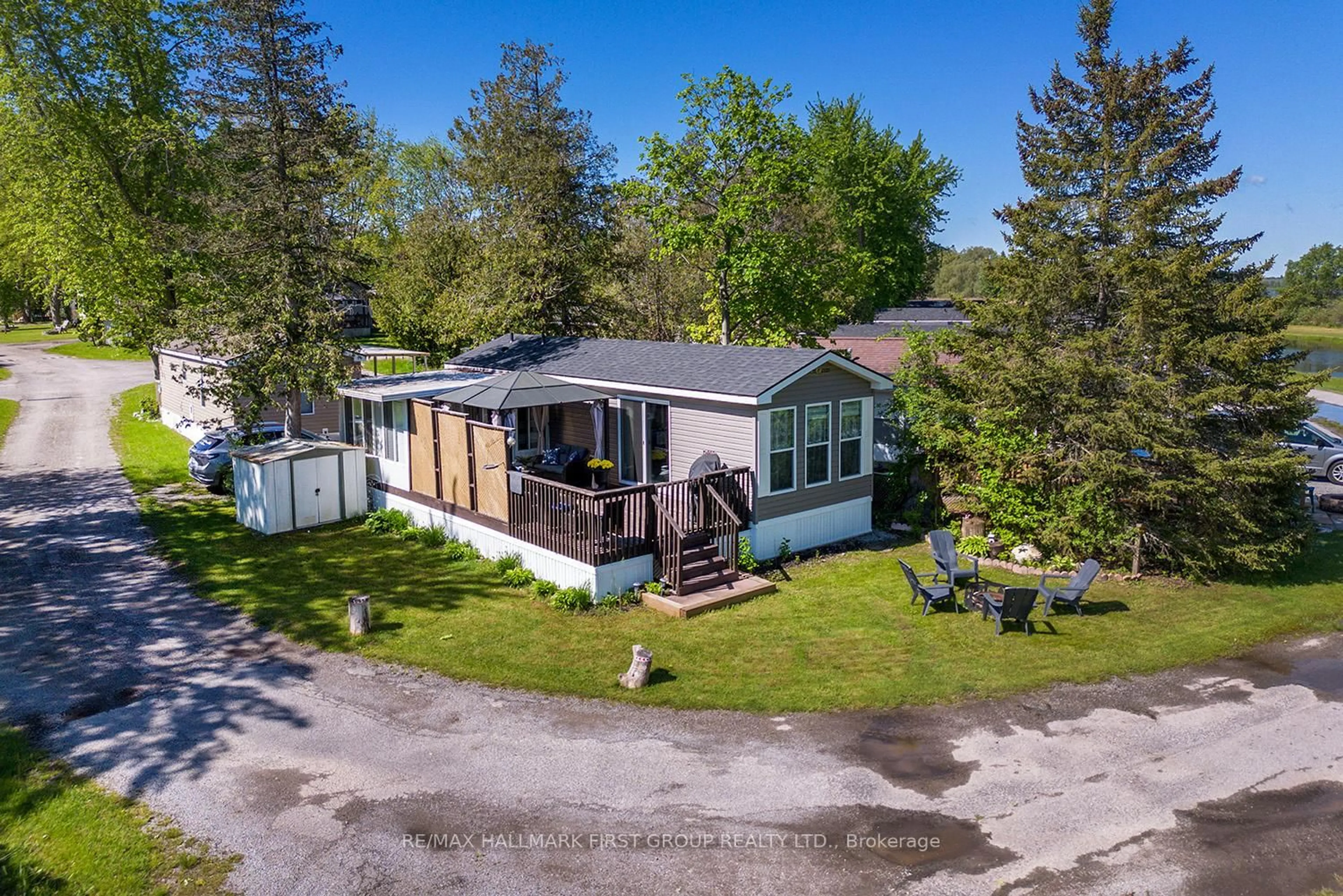 A pic from outside/outdoor area/front of a property/back of a property/a pic from drone, unknown for 225 Platten Blvd ##338, Scugog Ontario L9L 1B4