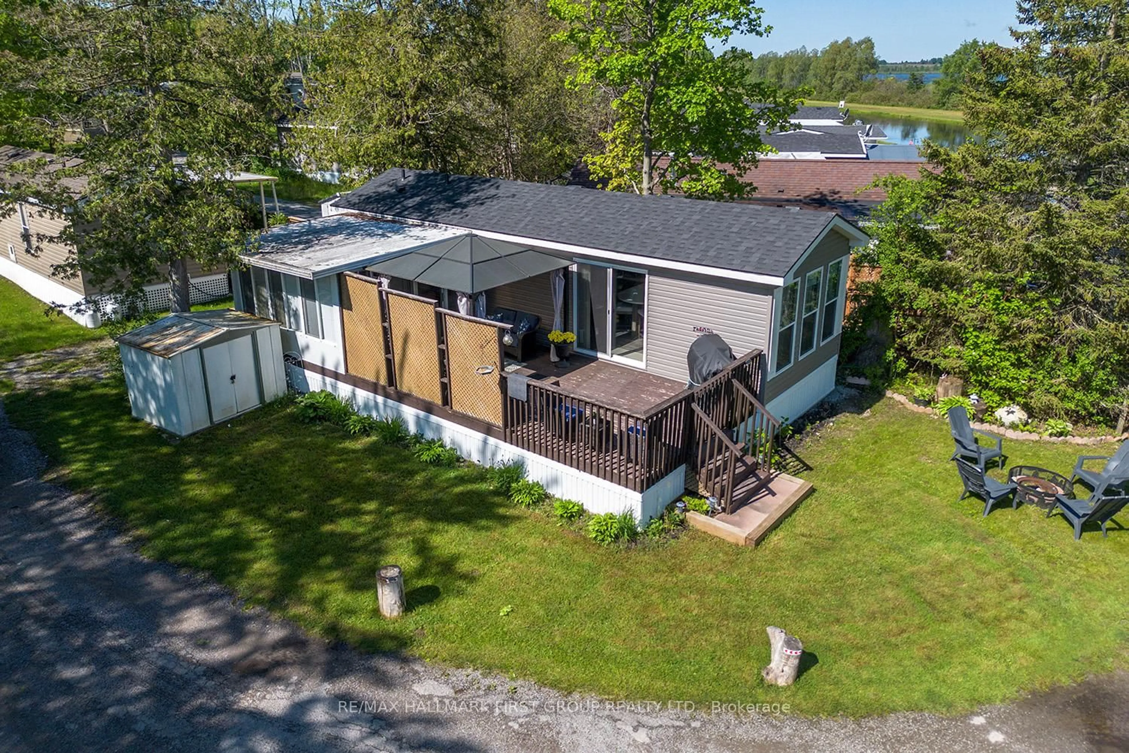 A pic from outside/outdoor area/front of a property/back of a property/a pic from drone, unknown for 225 Platten Blvd ##338, Scugog Ontario L9L 1B4