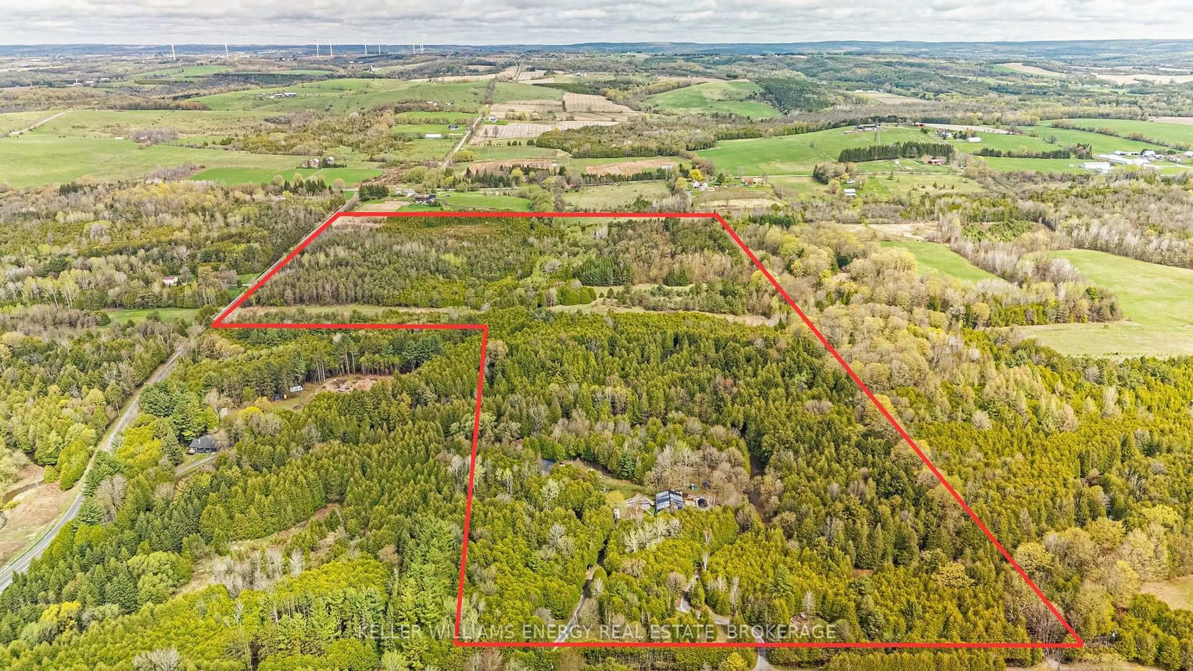 A pic from outside/outdoor area/front of a property/back of a property/a pic from drone, forest/trees view for 90 Cowanville Rd, Clarington Ontario L1B 1L9