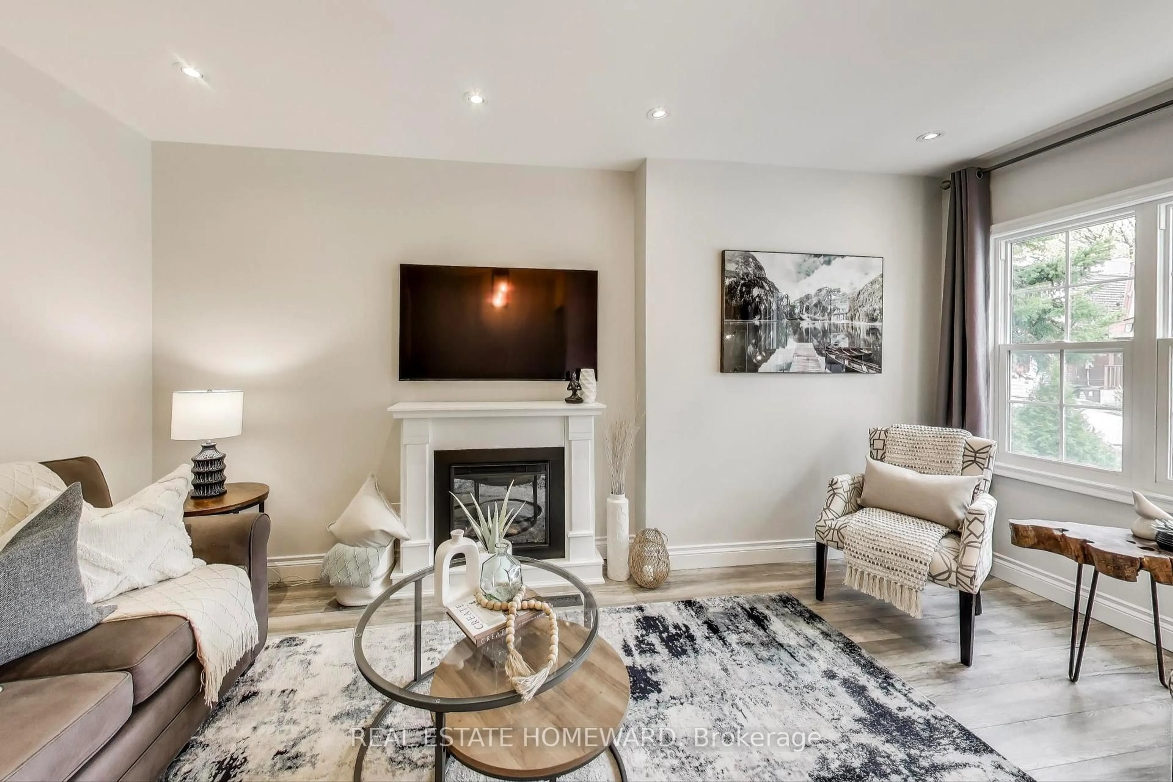 Living room with furniture, unknown for 23 Mountalan Ave, Toronto Ontario M4J 1H3