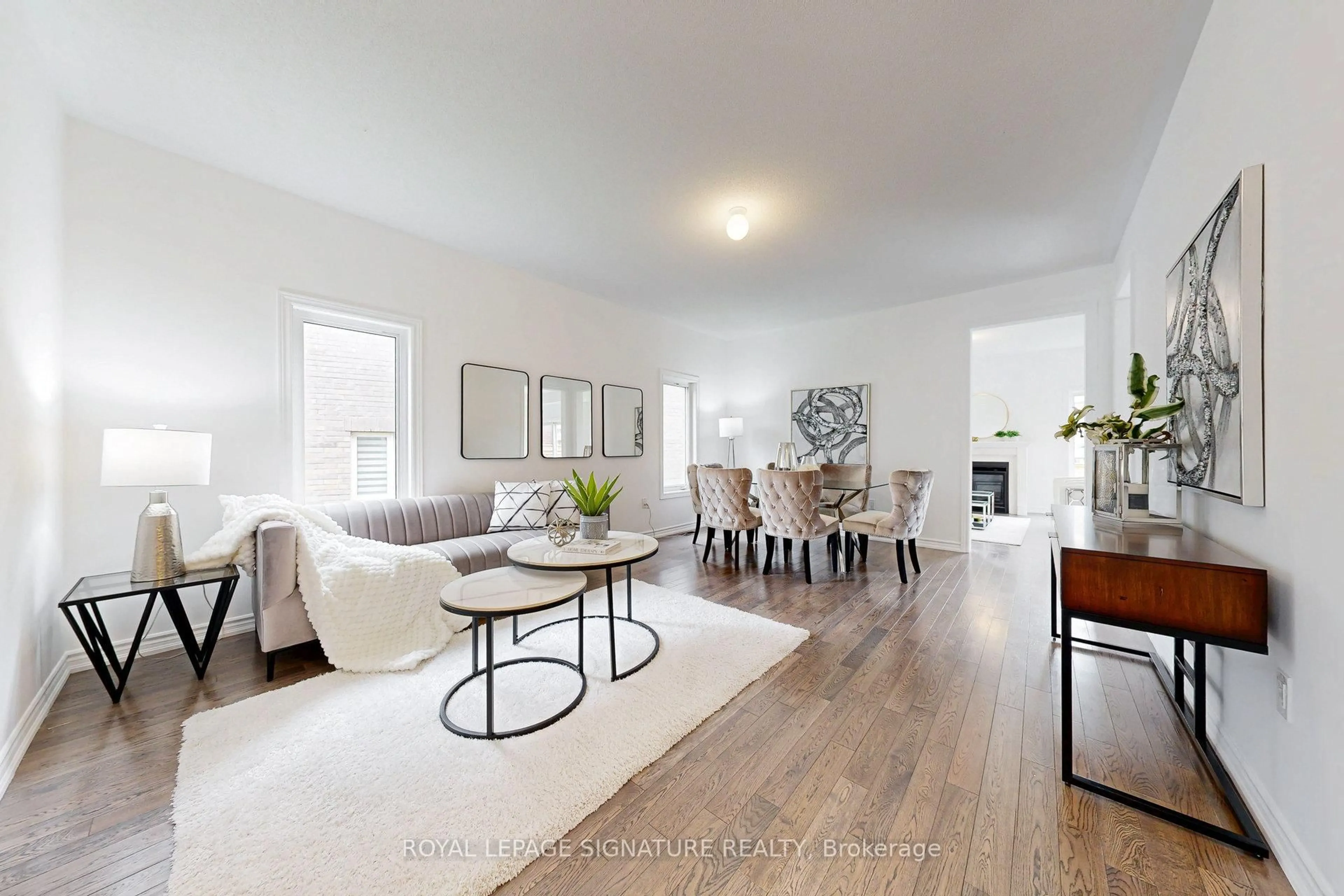 Living room with furniture, wood/laminate floor for 137 Elephant Hill Dr, Clarington Ontario L1C 0V9