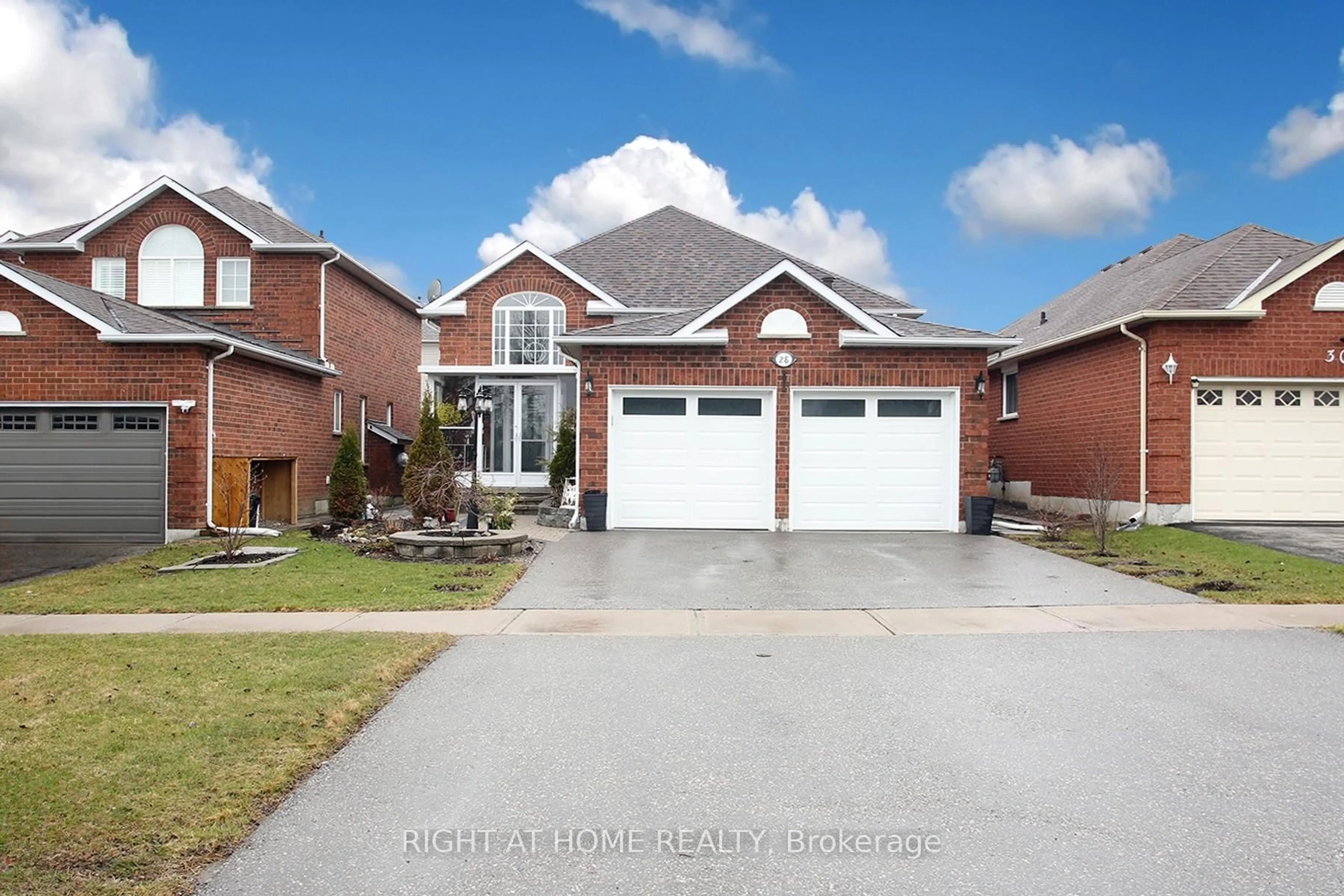 Home with brick exterior material, street for 28 West Side Dr, Clarington Ontario L1C 4Y8