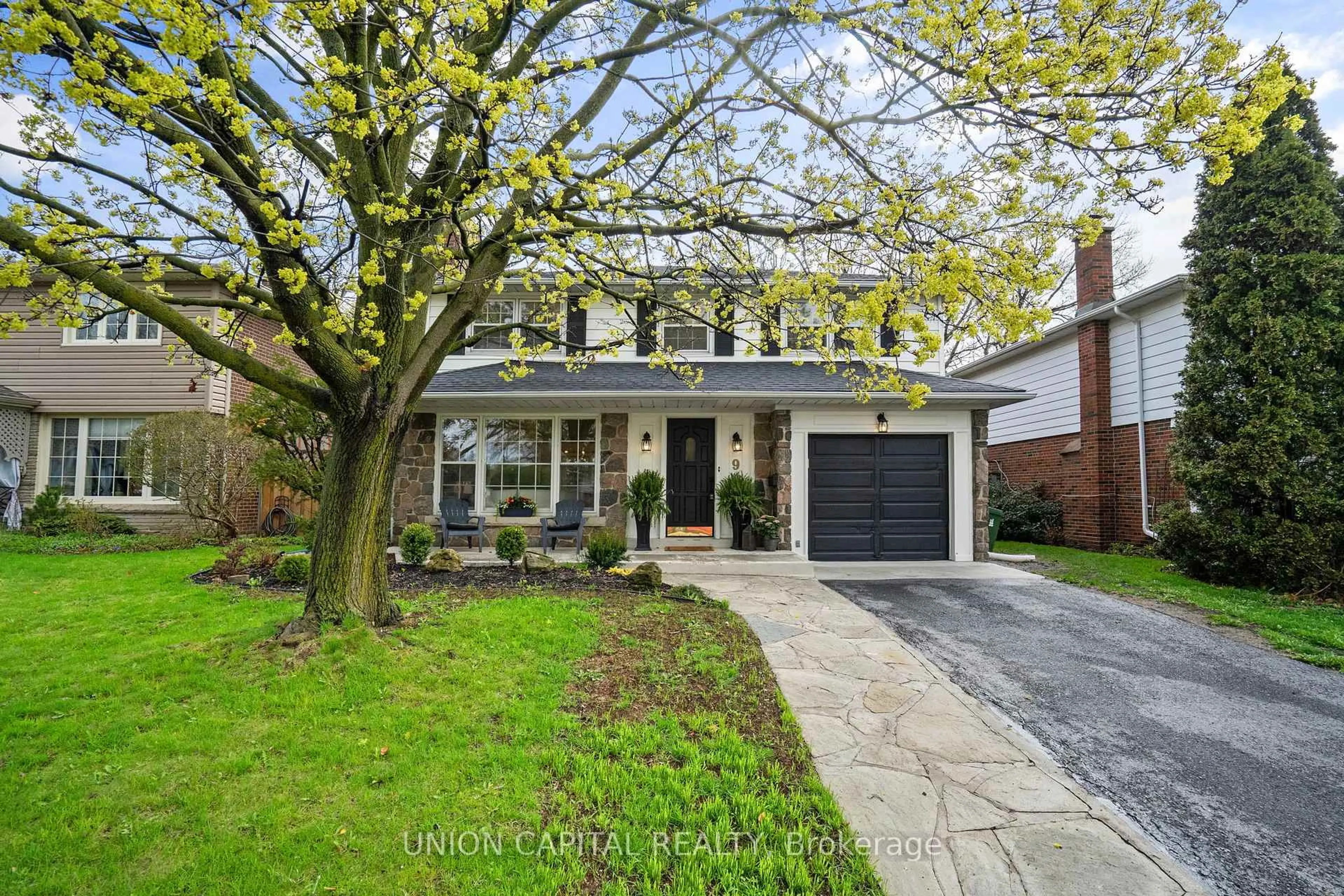 Home with brick exterior material, street for 9 Cathedral Bluffs Dr, Toronto Ontario M1M 2T6