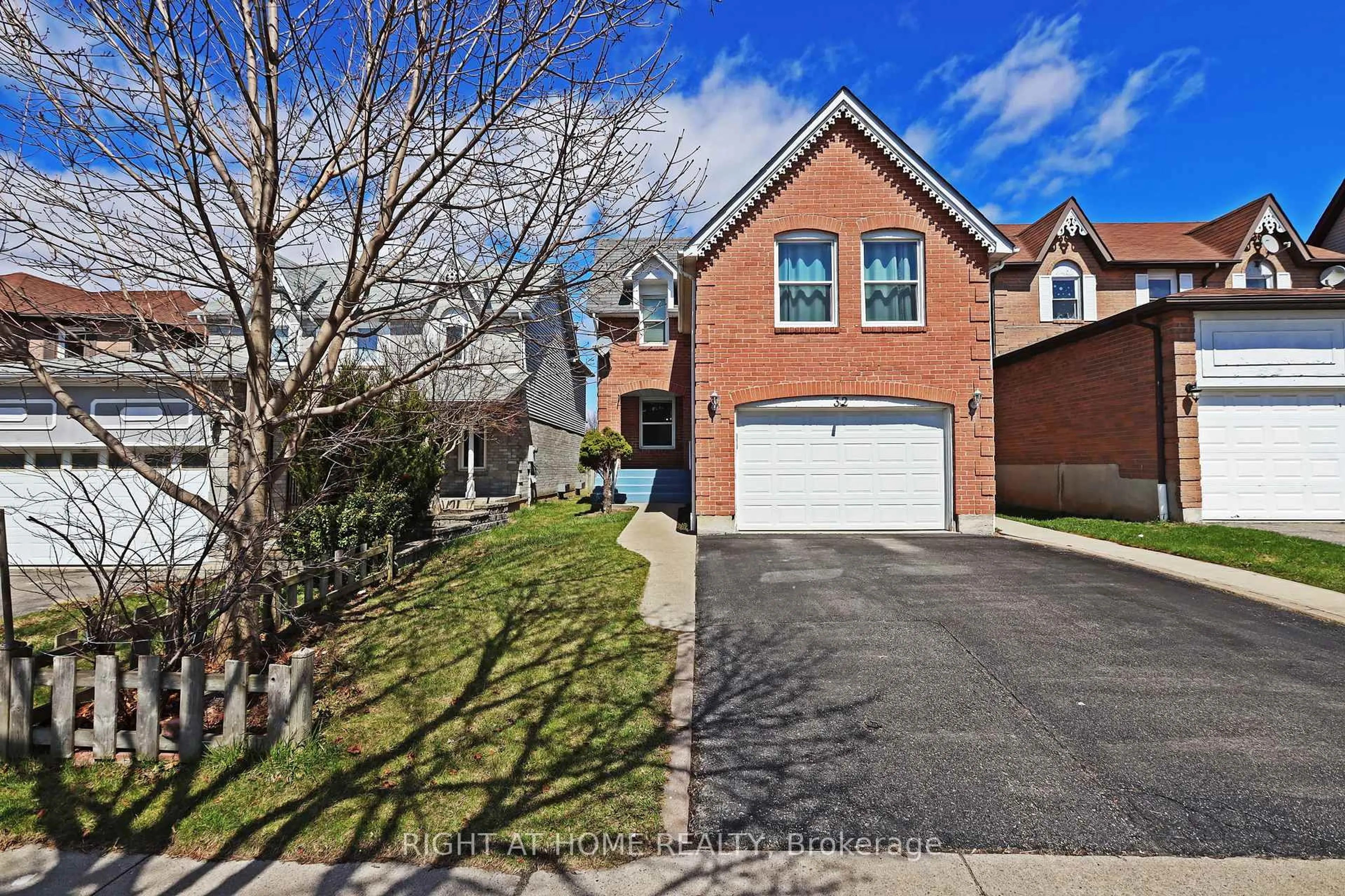 Home with brick exterior material, street for 32 Chapman Dr, Ajax Ontario L1T 3C3