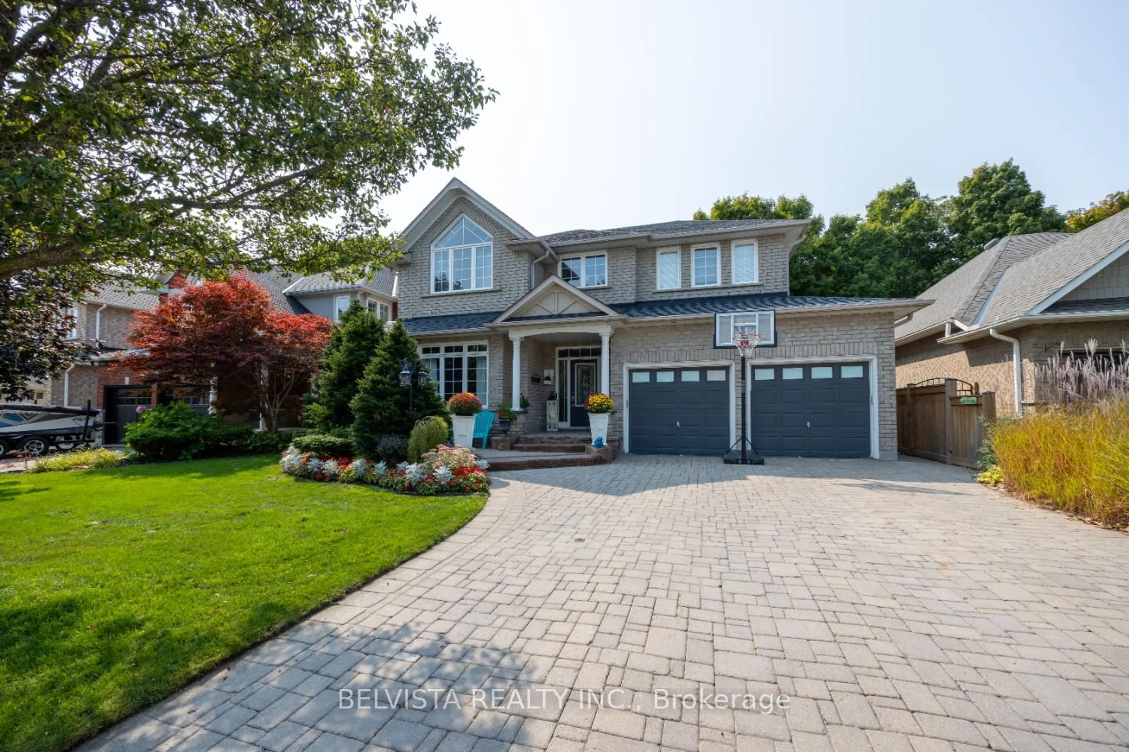 Home with brick exterior material, street for 2 Stillwater Crt, Whitby Ontario L1R 3P5