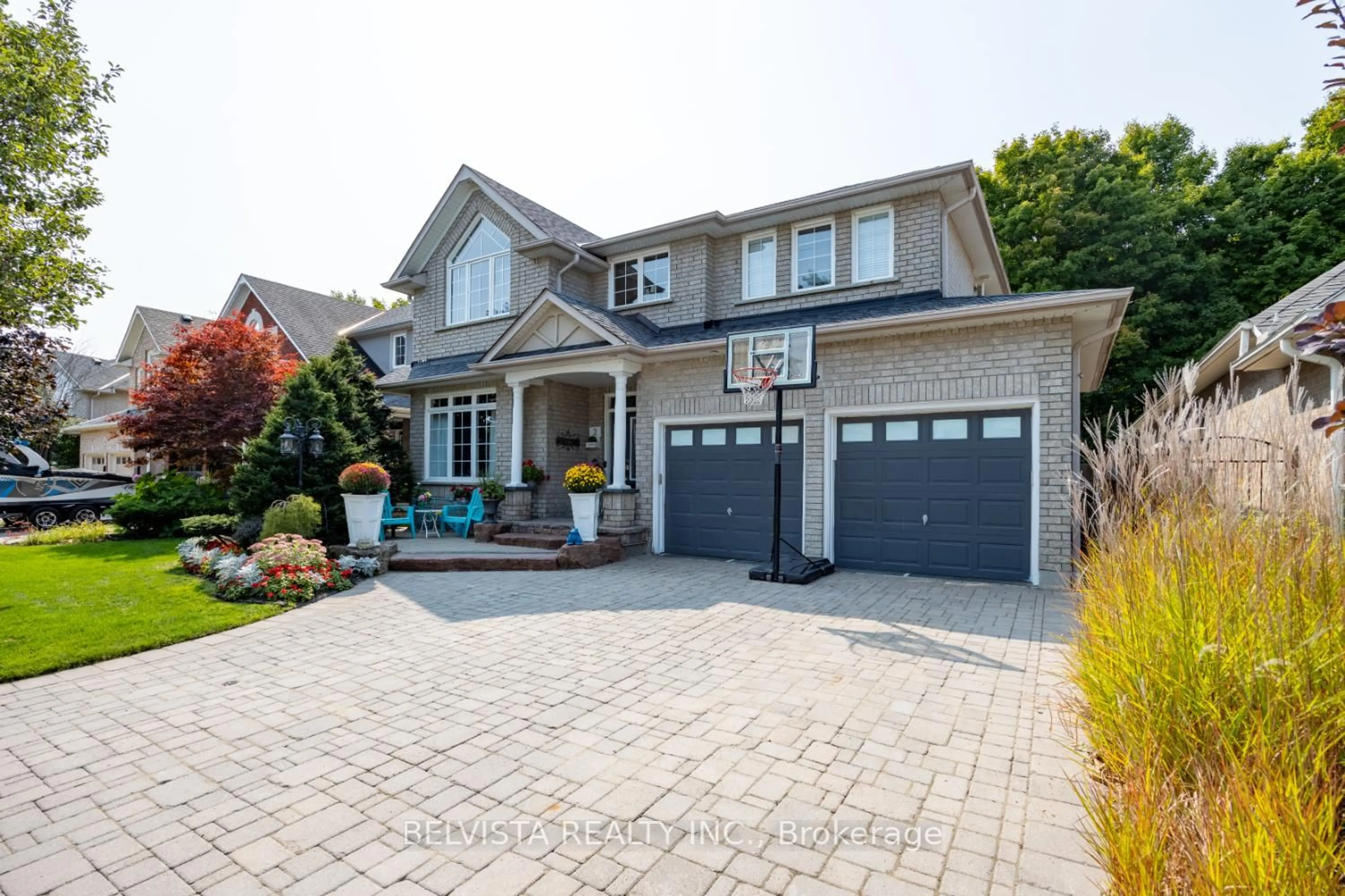 Home with brick exterior material, street for 2 Stillwater Crt, Whitby Ontario L1R 3P5
