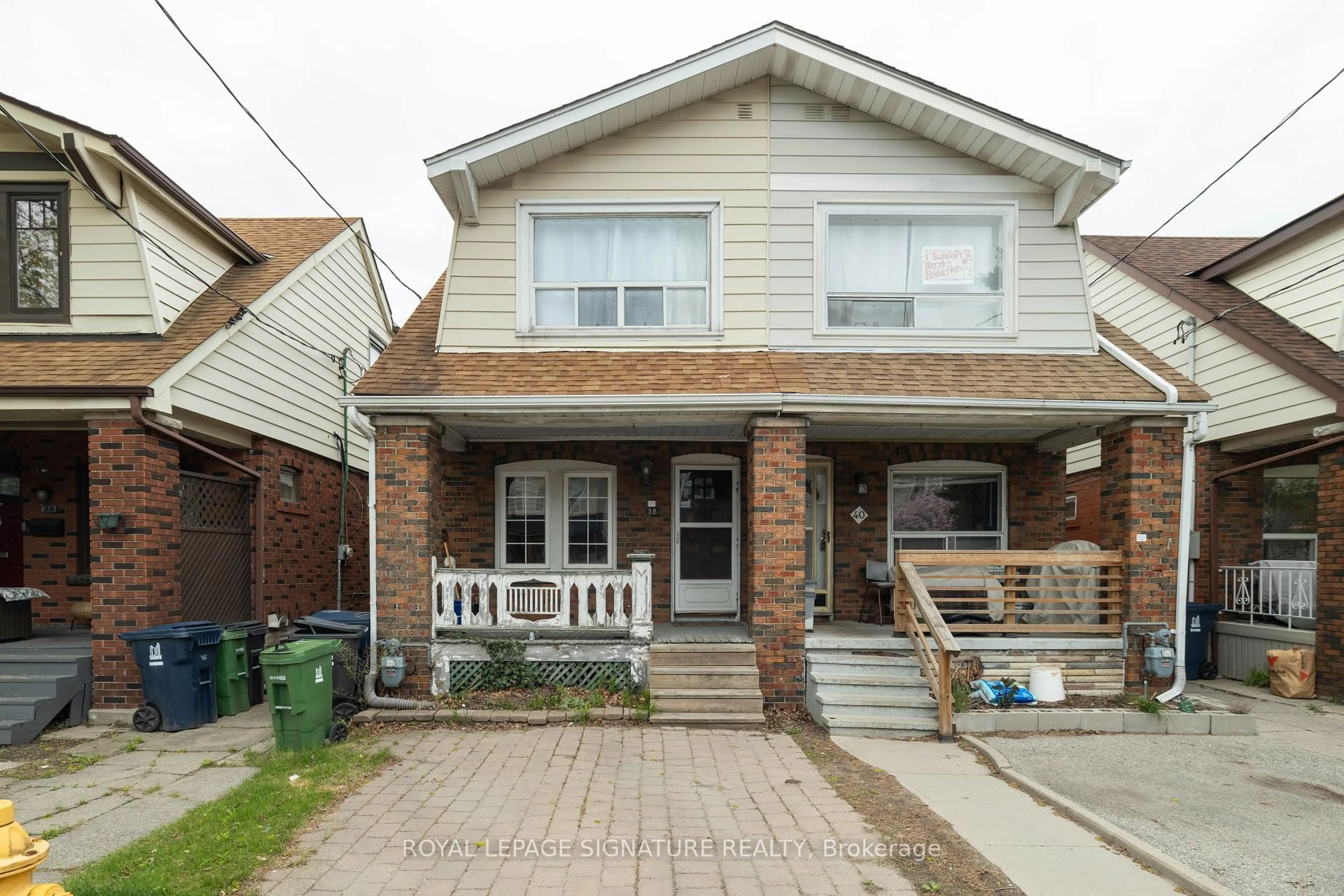 Home with brick exterior material, street for 38 Bonnie Brae Blvd, Toronto Ontario M4J 4N2