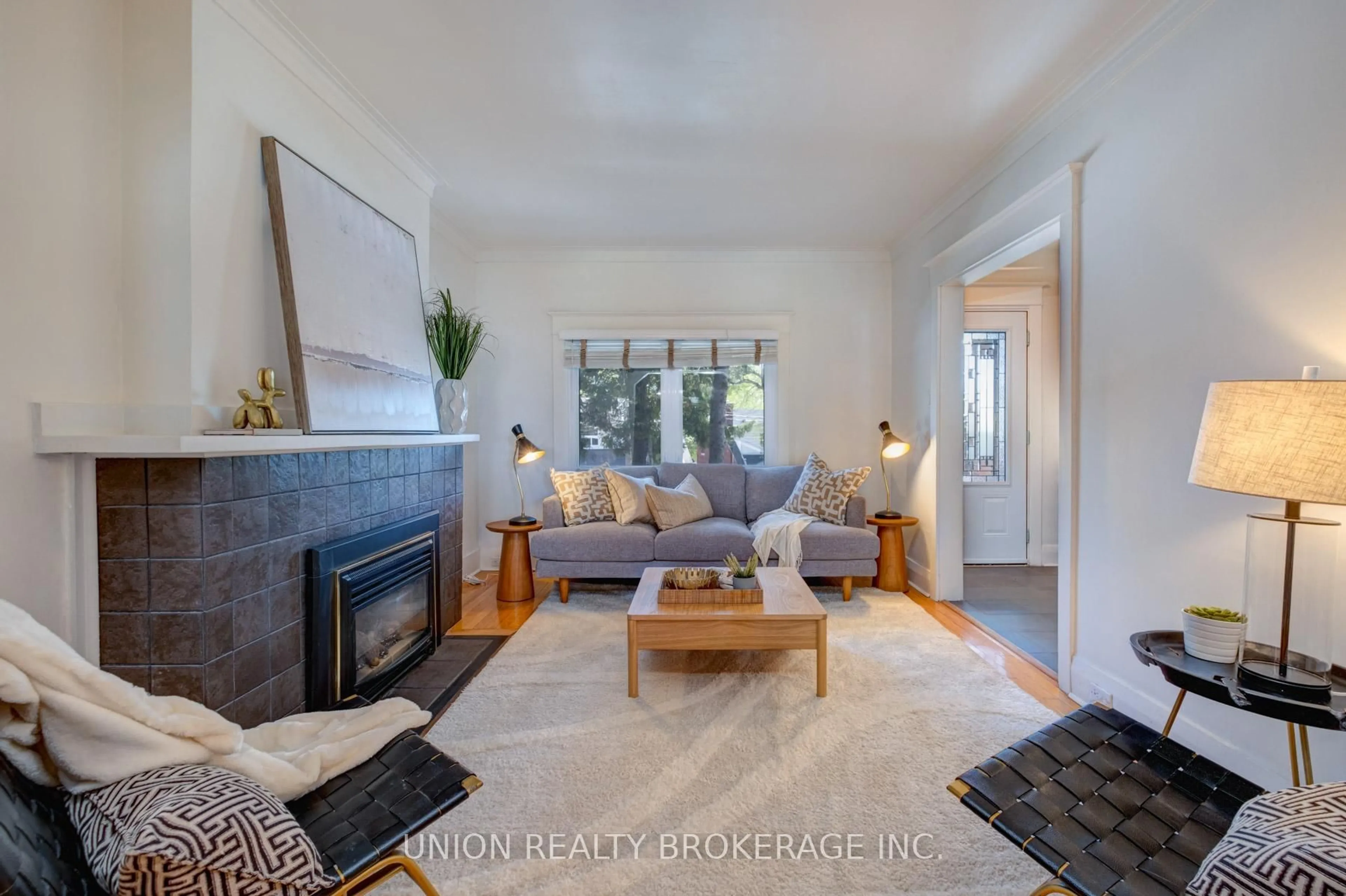 Living room with furniture, unknown for 1666 Gerrard St, Toronto Ontario M4L 2A8
