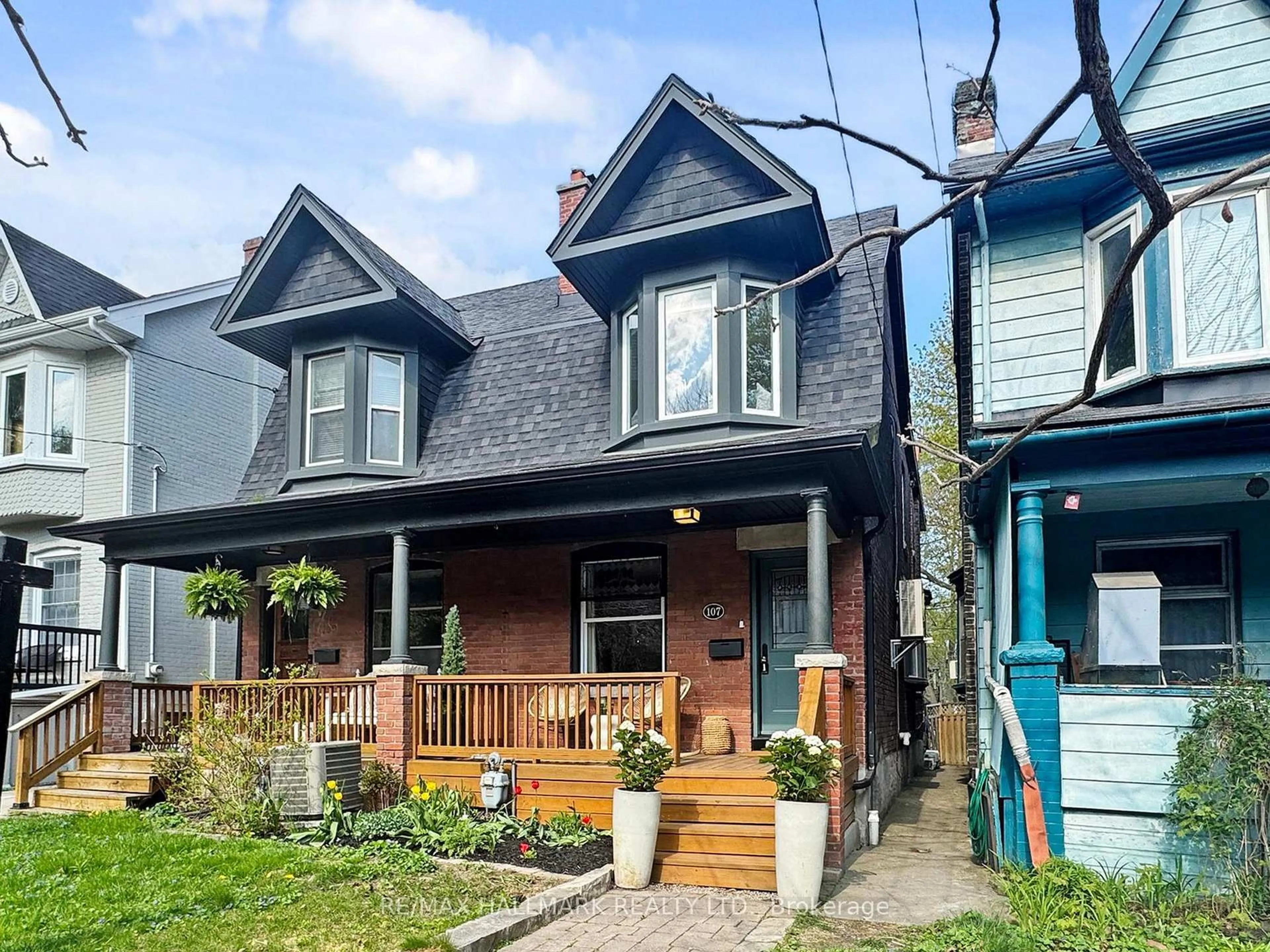 Home with brick exterior material, street for 107 Coady Ave, Toronto Ontario M4M 2Y9