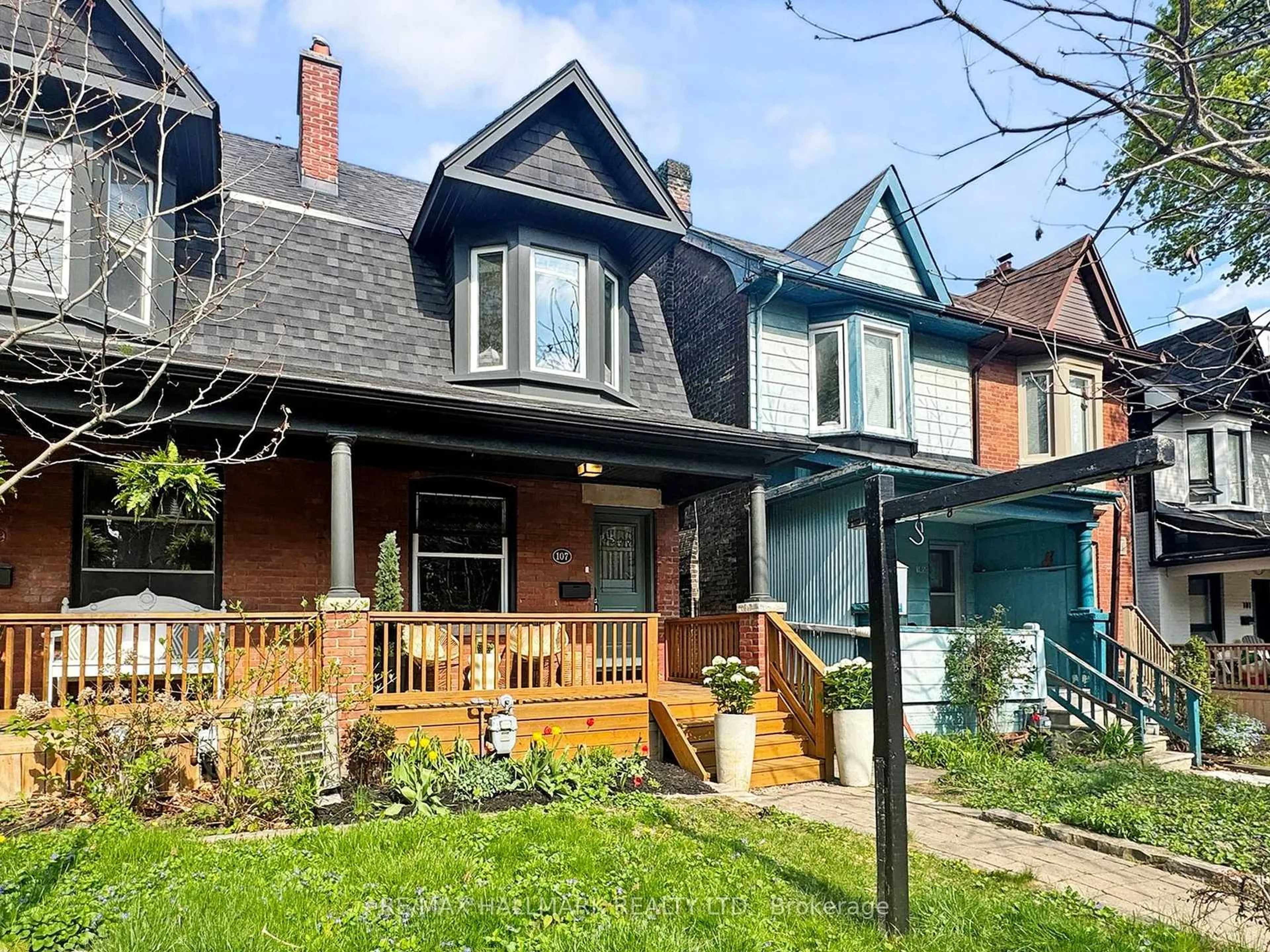 Home with brick exterior material, street for 107 Coady Ave, Toronto Ontario M4M 2Y9