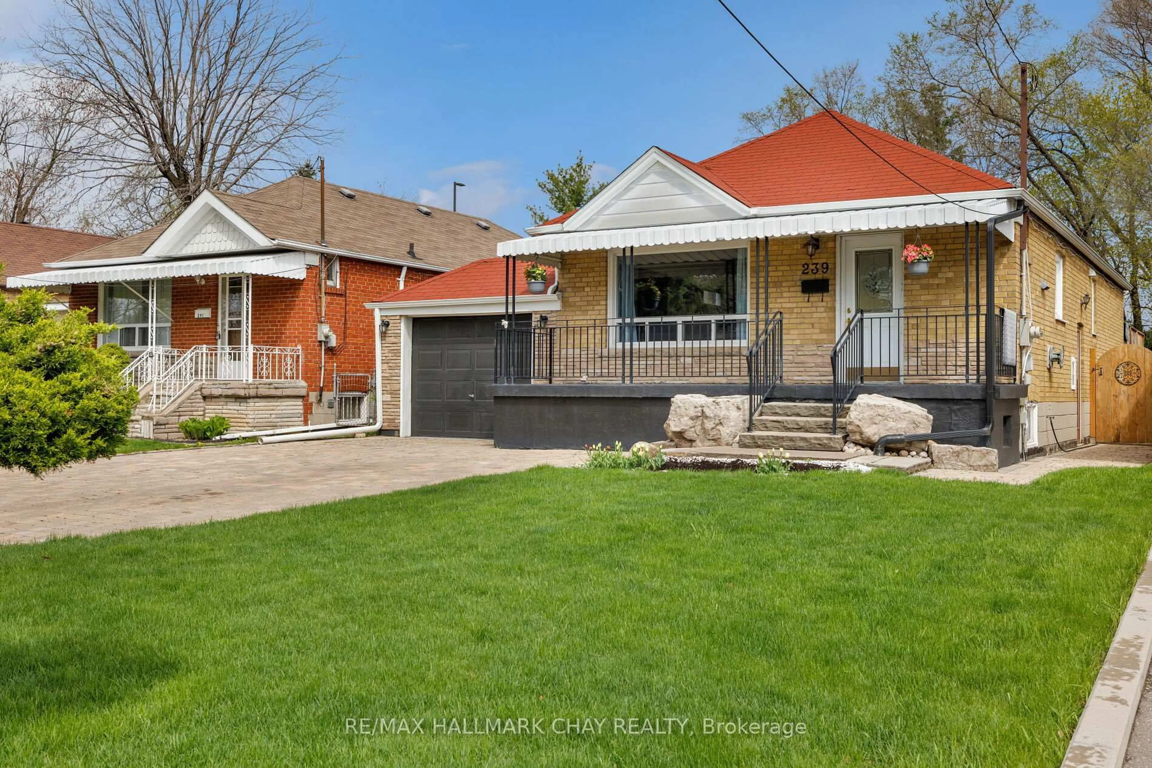 Home with brick exterior material, street for 239 Ellington Dr, Toronto Ontario M1R 3Y2