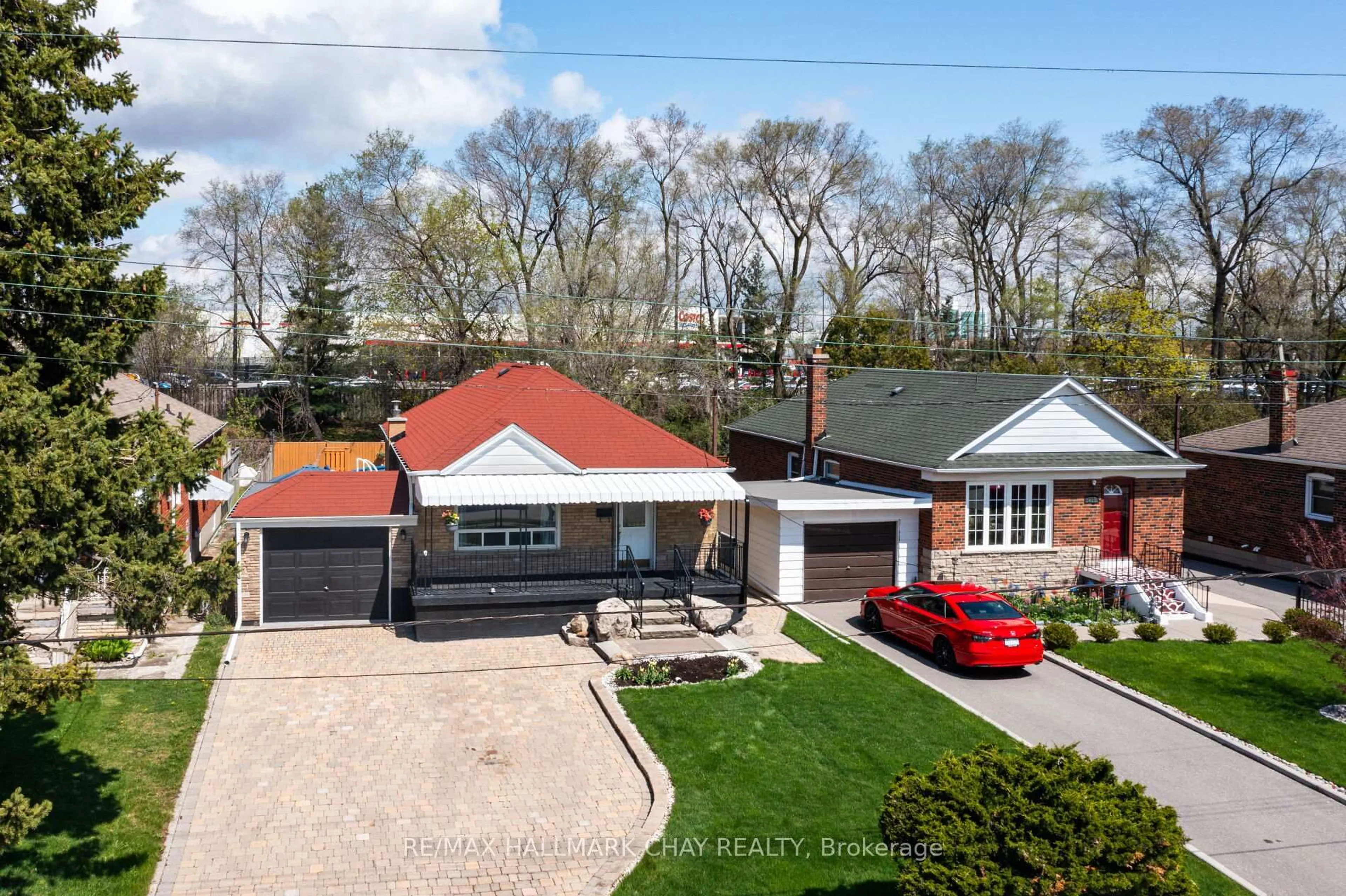 A pic from outside/outdoor area/front of a property/back of a property/a pic from drone, street for 239 Ellington Dr, Toronto Ontario M1R 3Y2