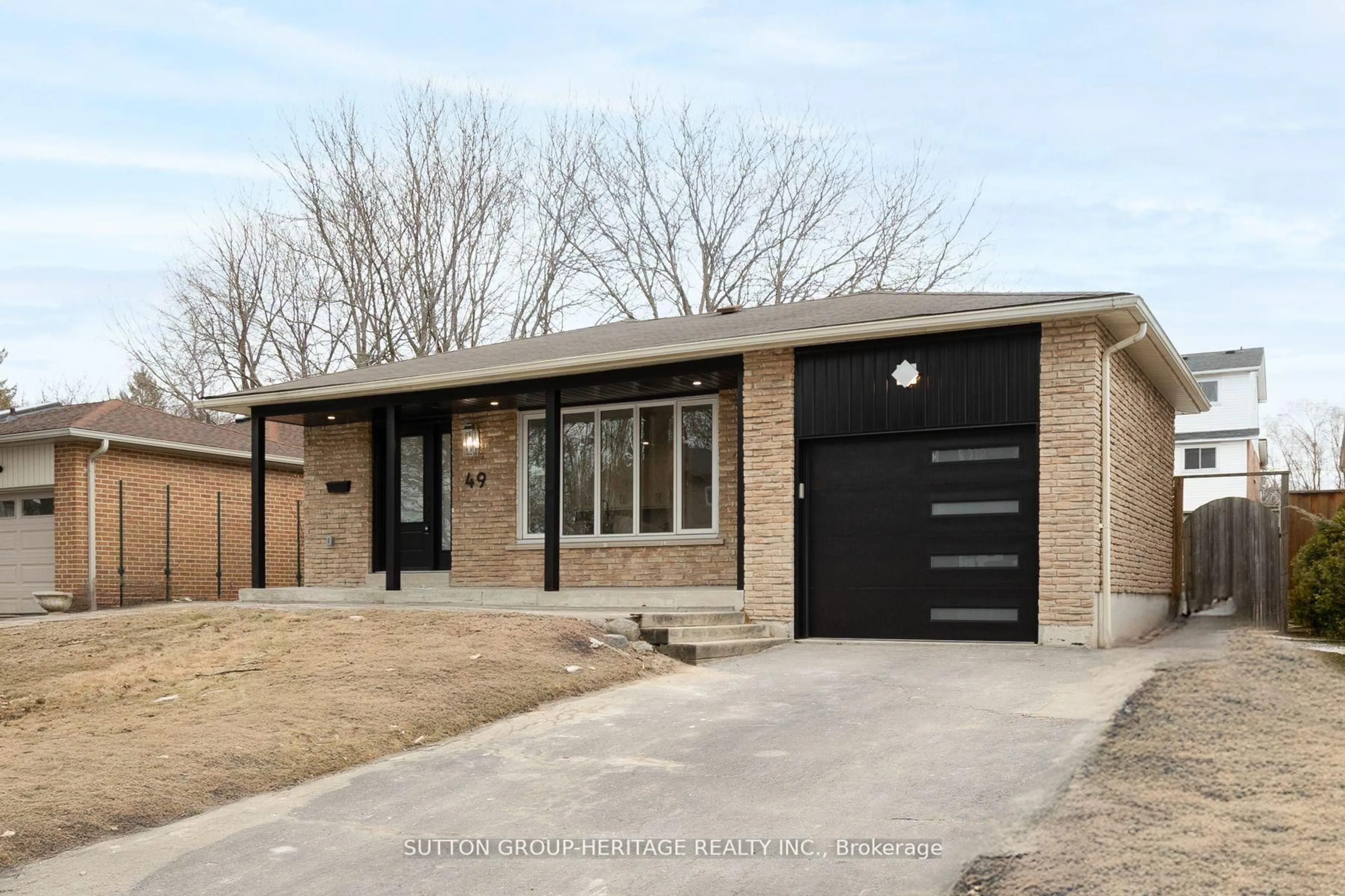 Home with brick exterior material, street for 49 Calais St, Whitby Ontario L1N 5M3