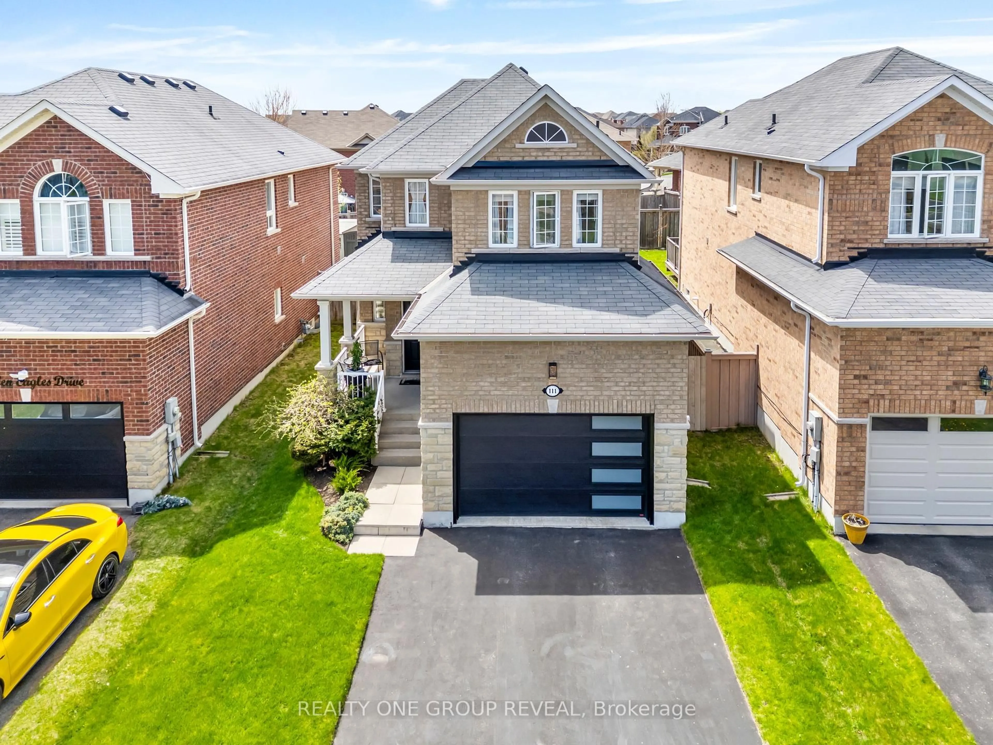 A pic from outside/outdoor area/front of a property/back of a property/a pic from drone, street for 111 Glen Eagles Dr, Clarington Ontario L1E 3H8