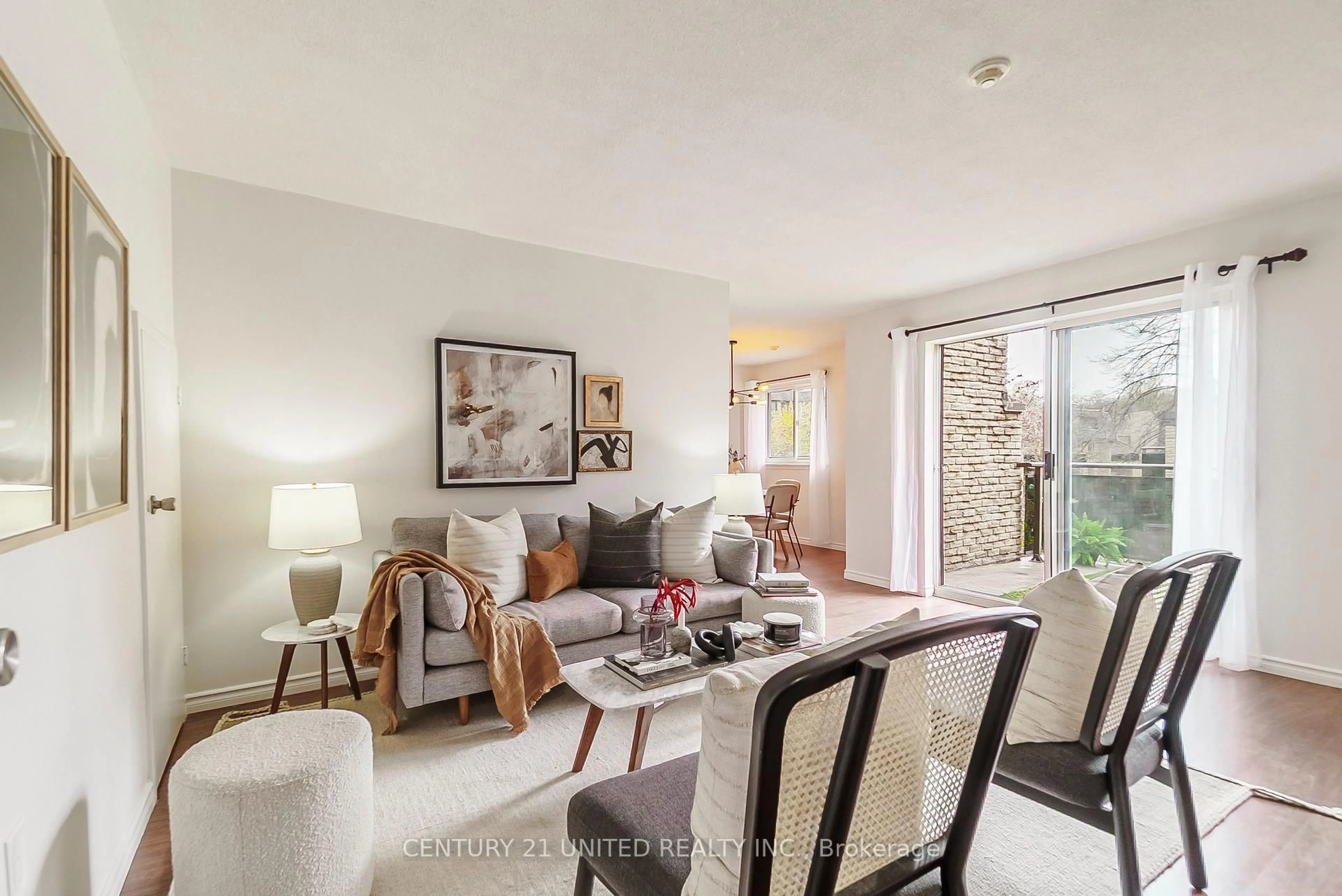 Living room with furniture, unknown for 140 Ling Rd #101, Toronto Ontario M1E 4V9