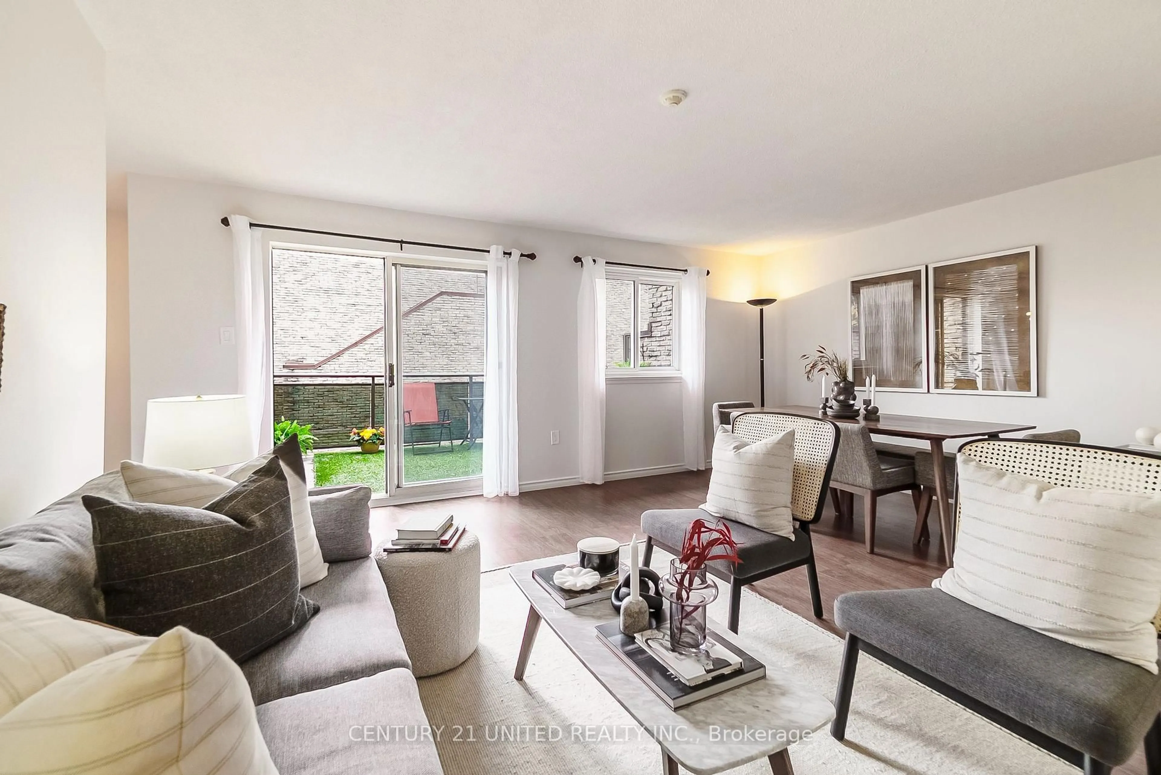 Living room with furniture, unknown for 140 Ling Rd #101, Toronto Ontario M1E 4V9
