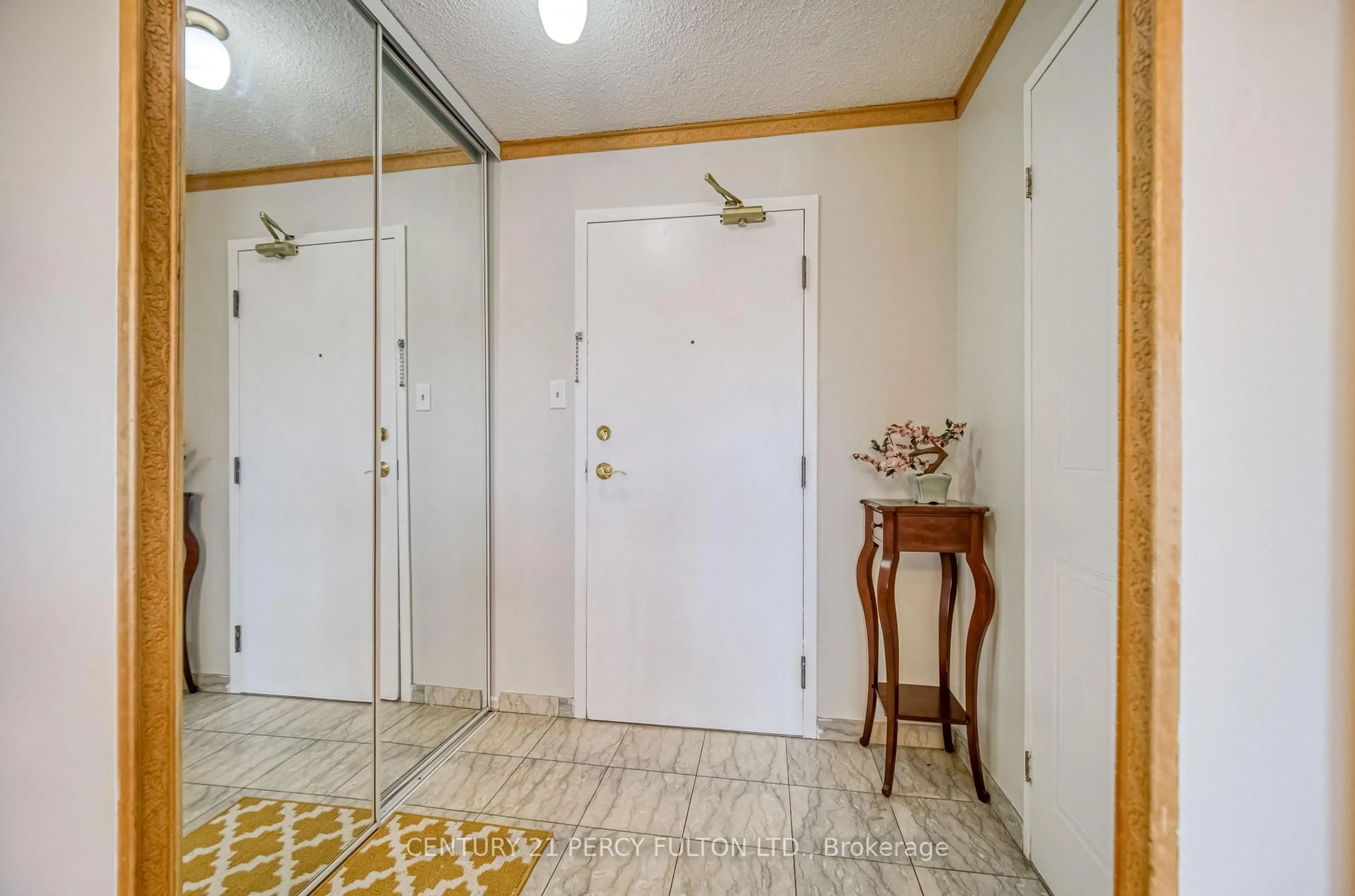 Indoor foyer for 11753 Sheppard Ave #506, Toronto Ontario M1B 5M3