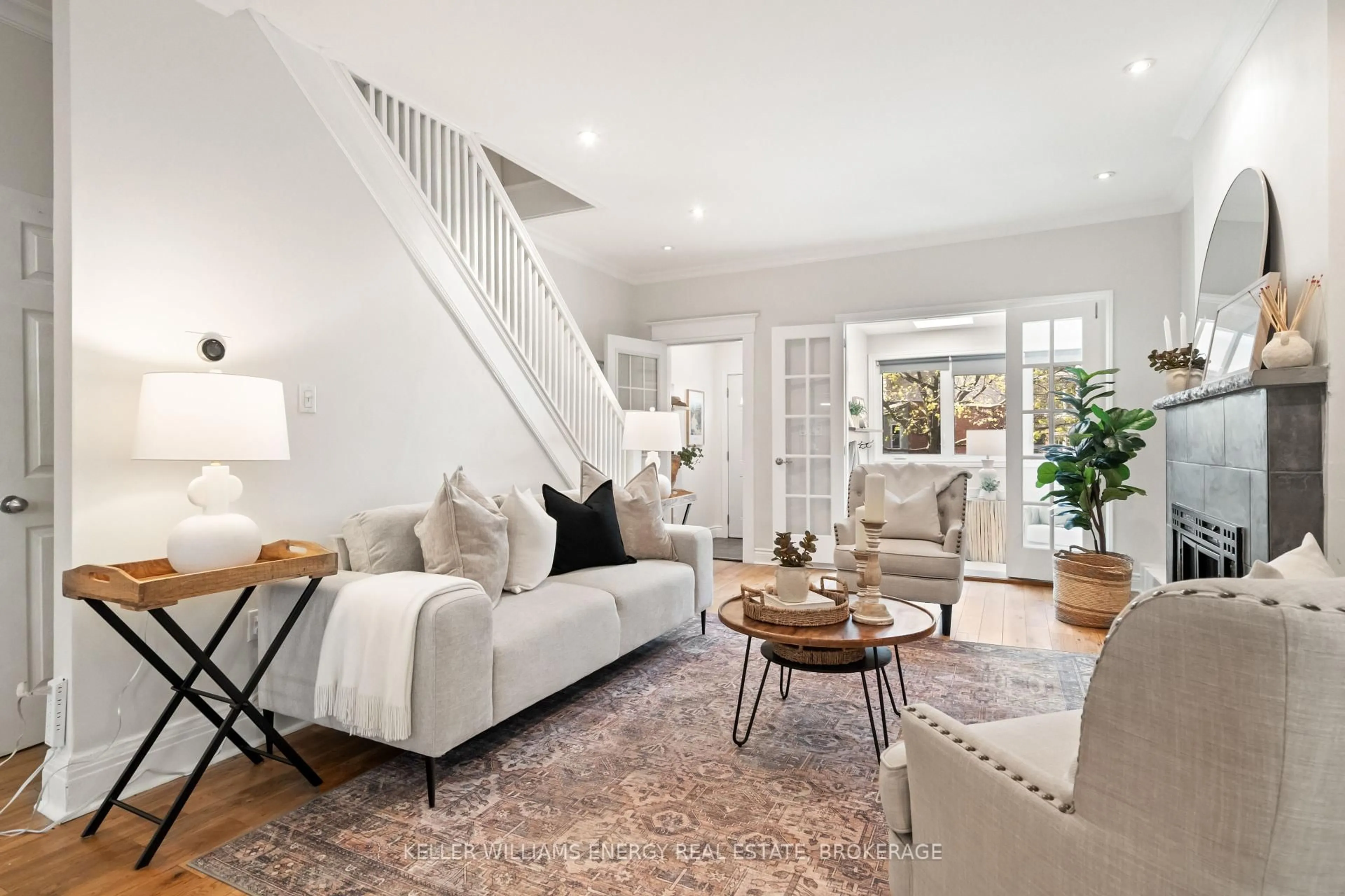 Living room with furniture, unknown for 205 Balsam Ave, Toronto Ontario M4E 3C4