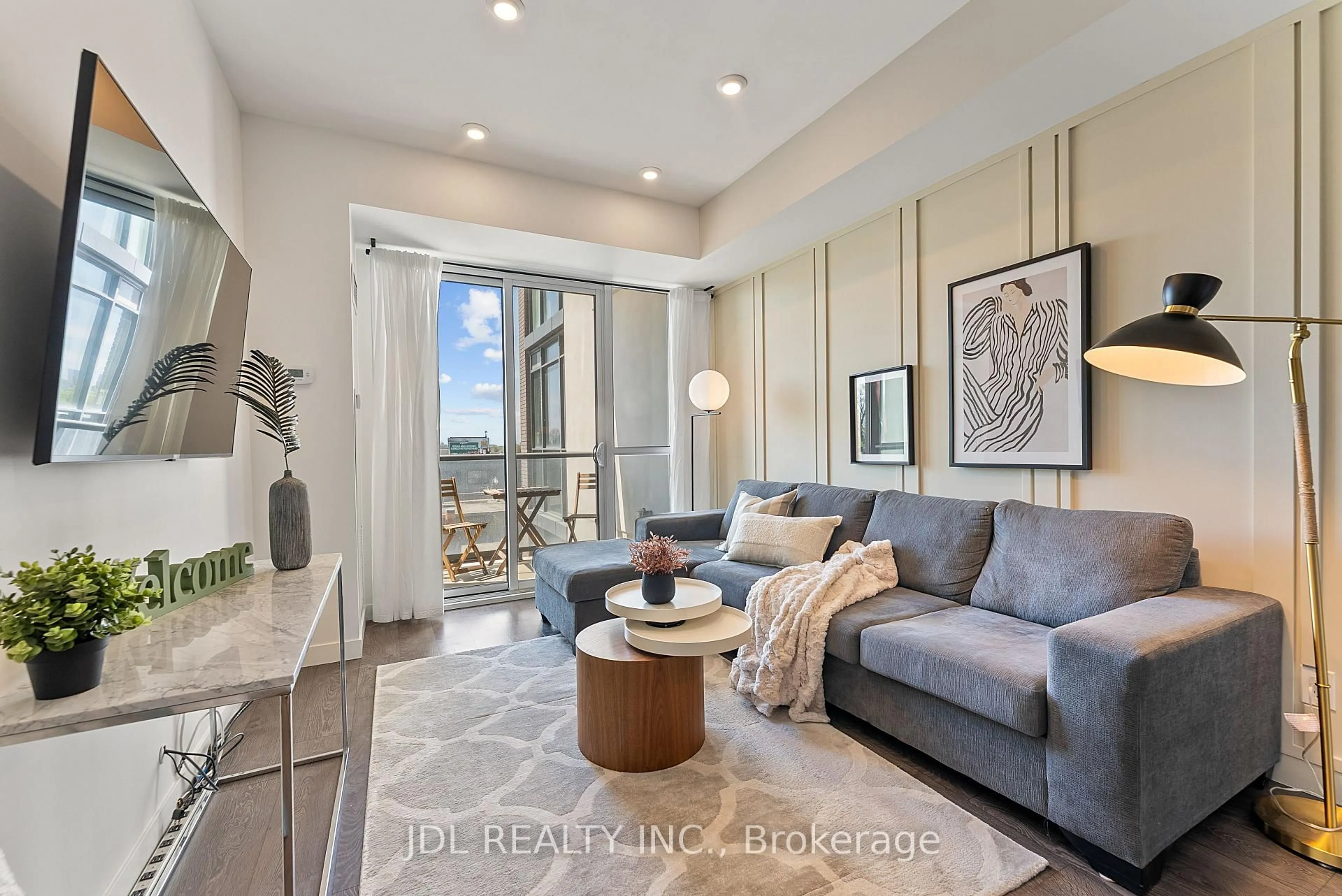 Living room with furniture, unknown for 2055 Danforth Ave #301, Toronto Ontario M4C 1J8