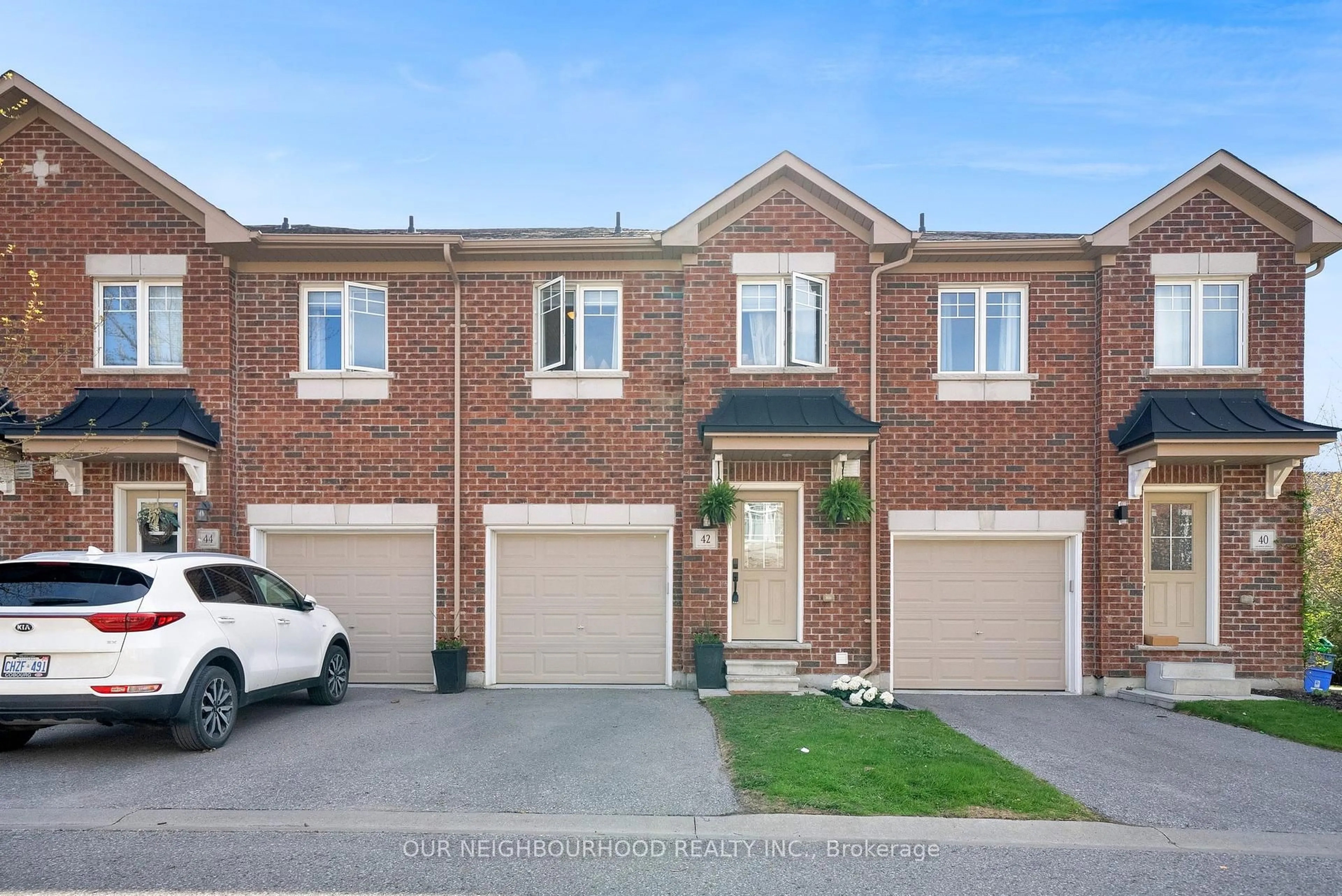 Home with brick exterior material, street for 42 Markham Tr, Clarington Ontario L1C 0S4