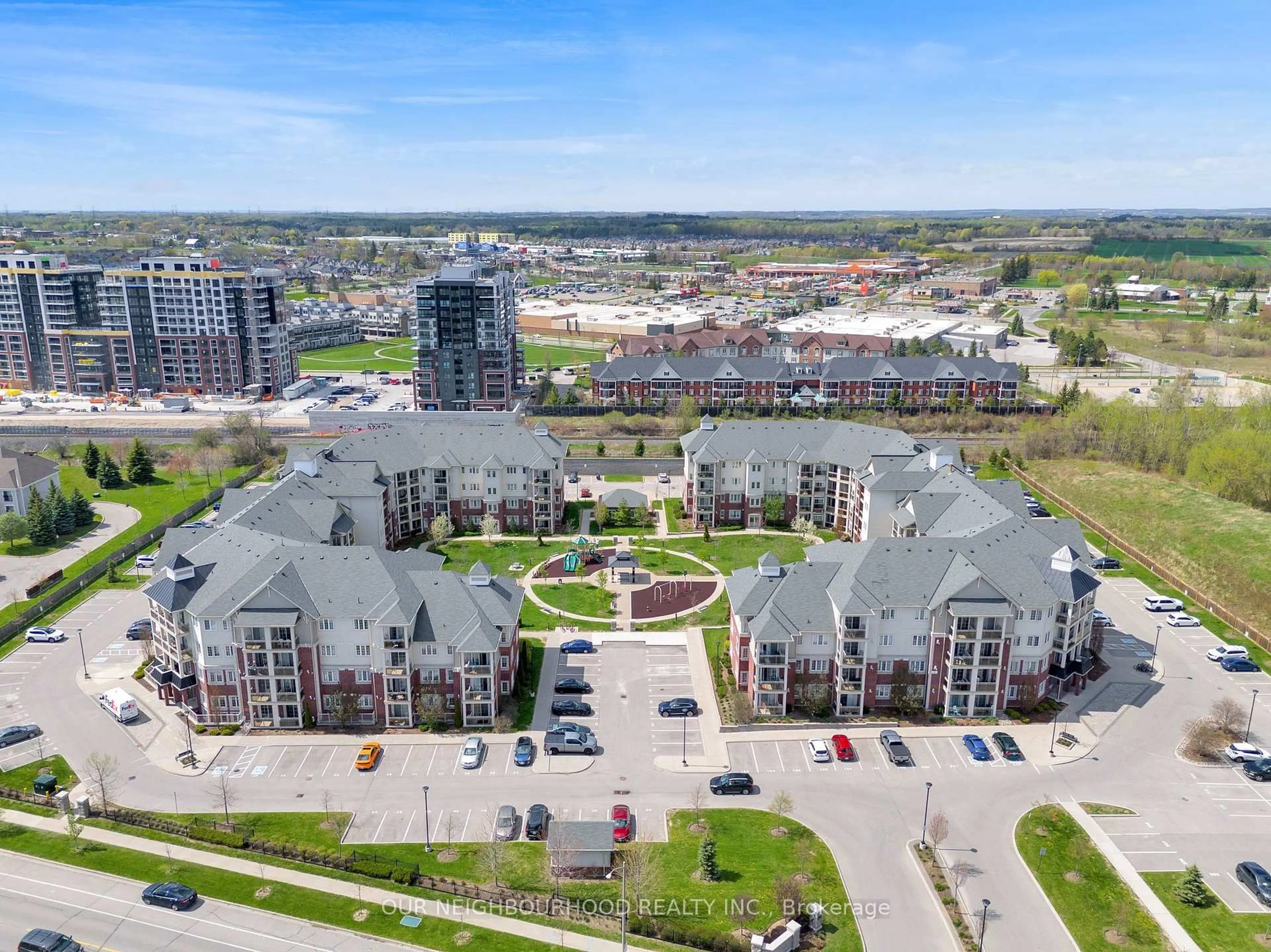 A pic from outside/outdoor area/front of a property/back of a property/a pic from drone, city buildings view from balcony for 80 Aspen Springs Dr #207, Clarington Ontario L1C 0V4