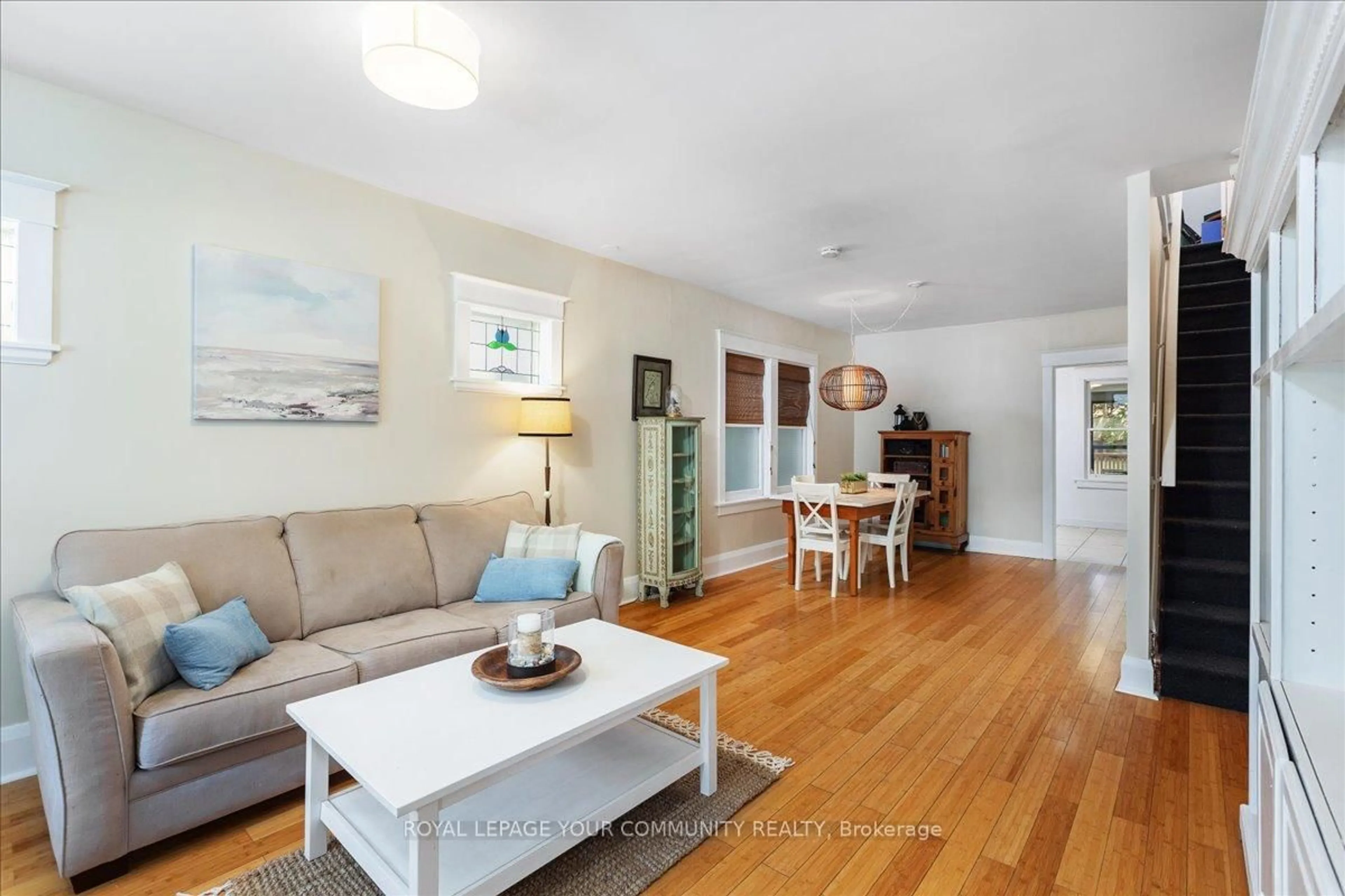 Living room with furniture, wood/laminate floor for 917 Broadview Ave, Toronto Ontario M4K 2R2