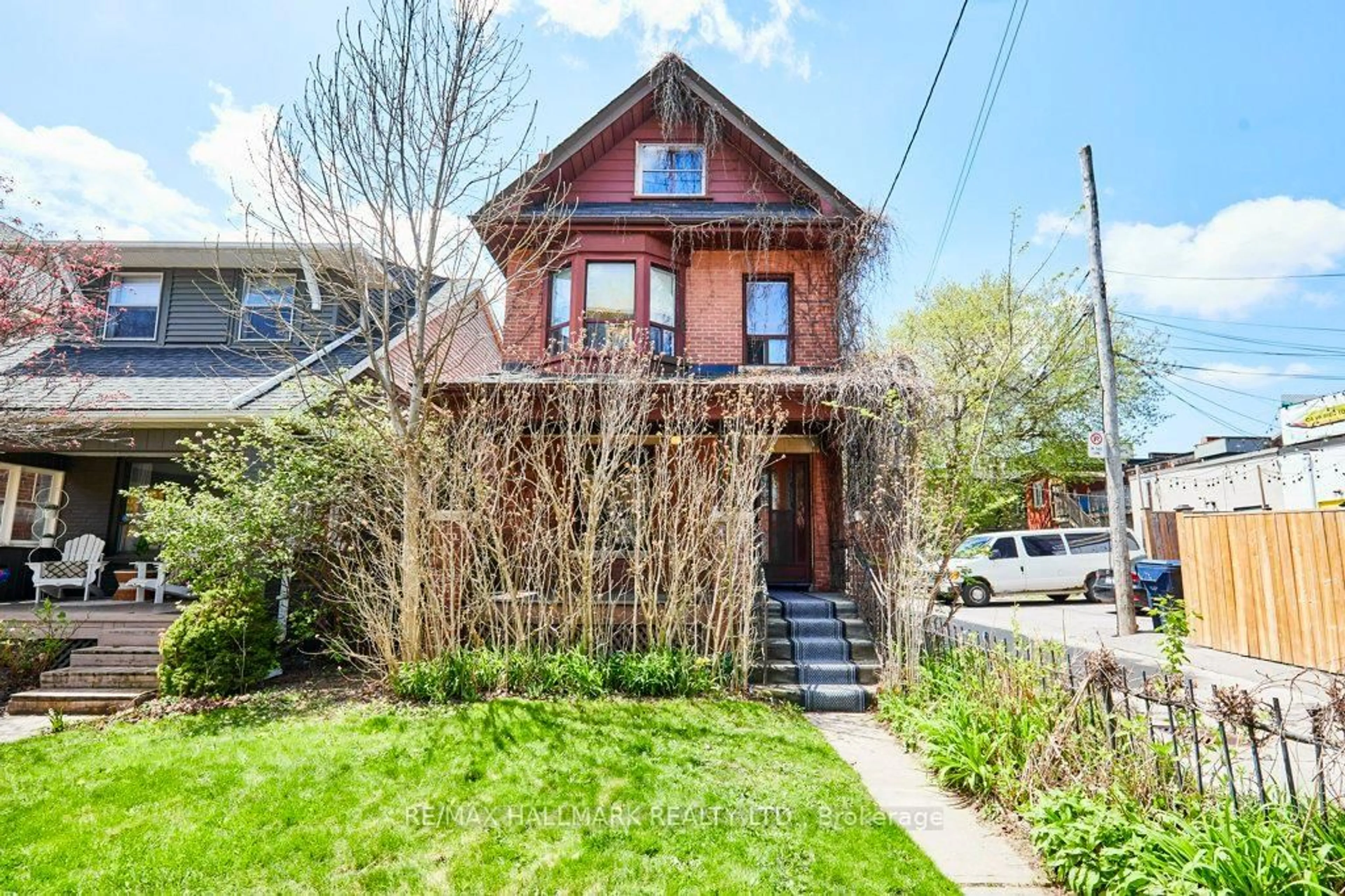 Home with brick exterior material, street for 116 Hiawatha Rd, Toronto Ontario M4L 2X8
