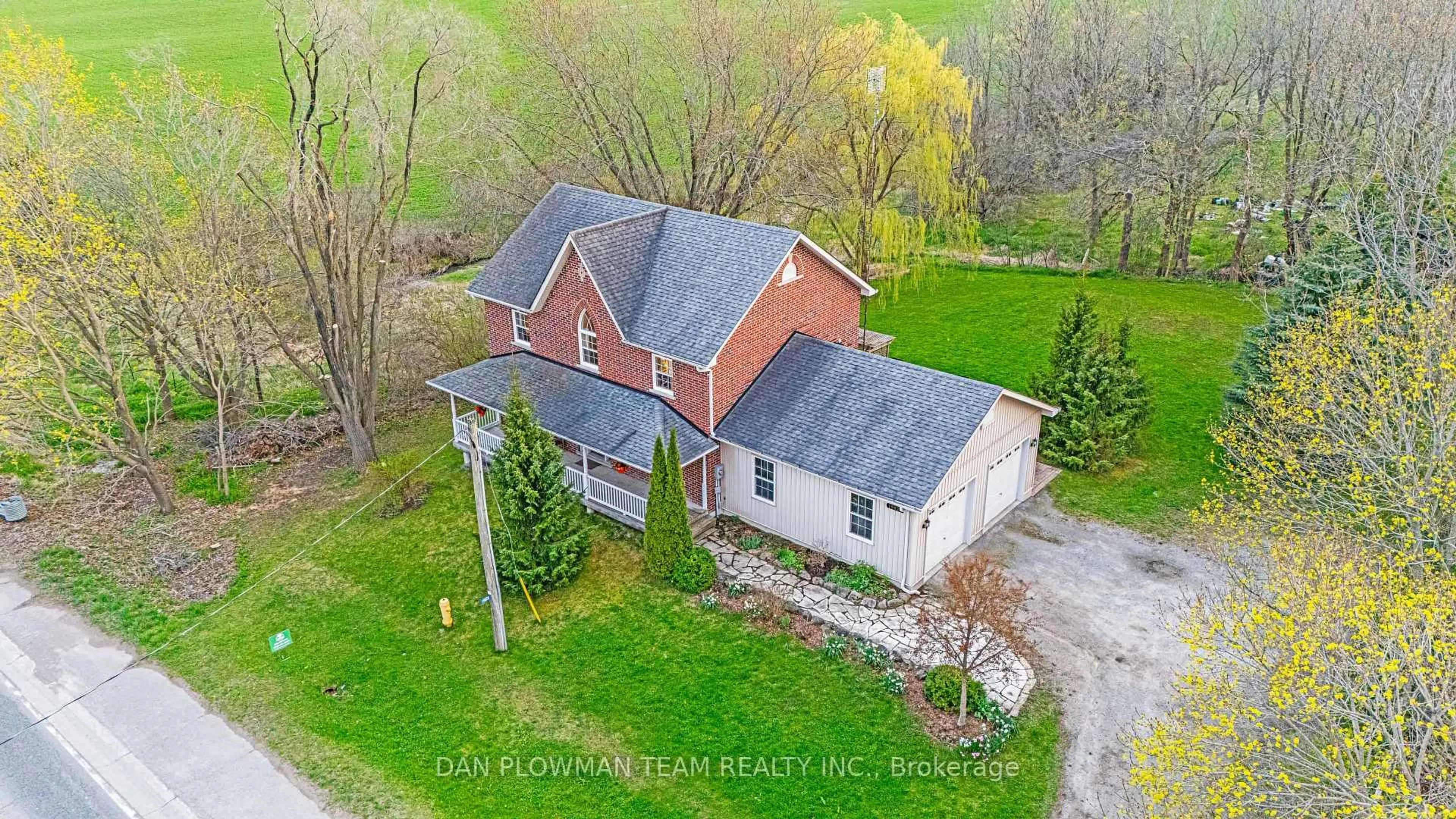 A pic from outside/outdoor area/front of a property/back of a property/a pic from drone, unknown for 19826 Highway 12 Highway, Scugog Ontario L0C 1B0
