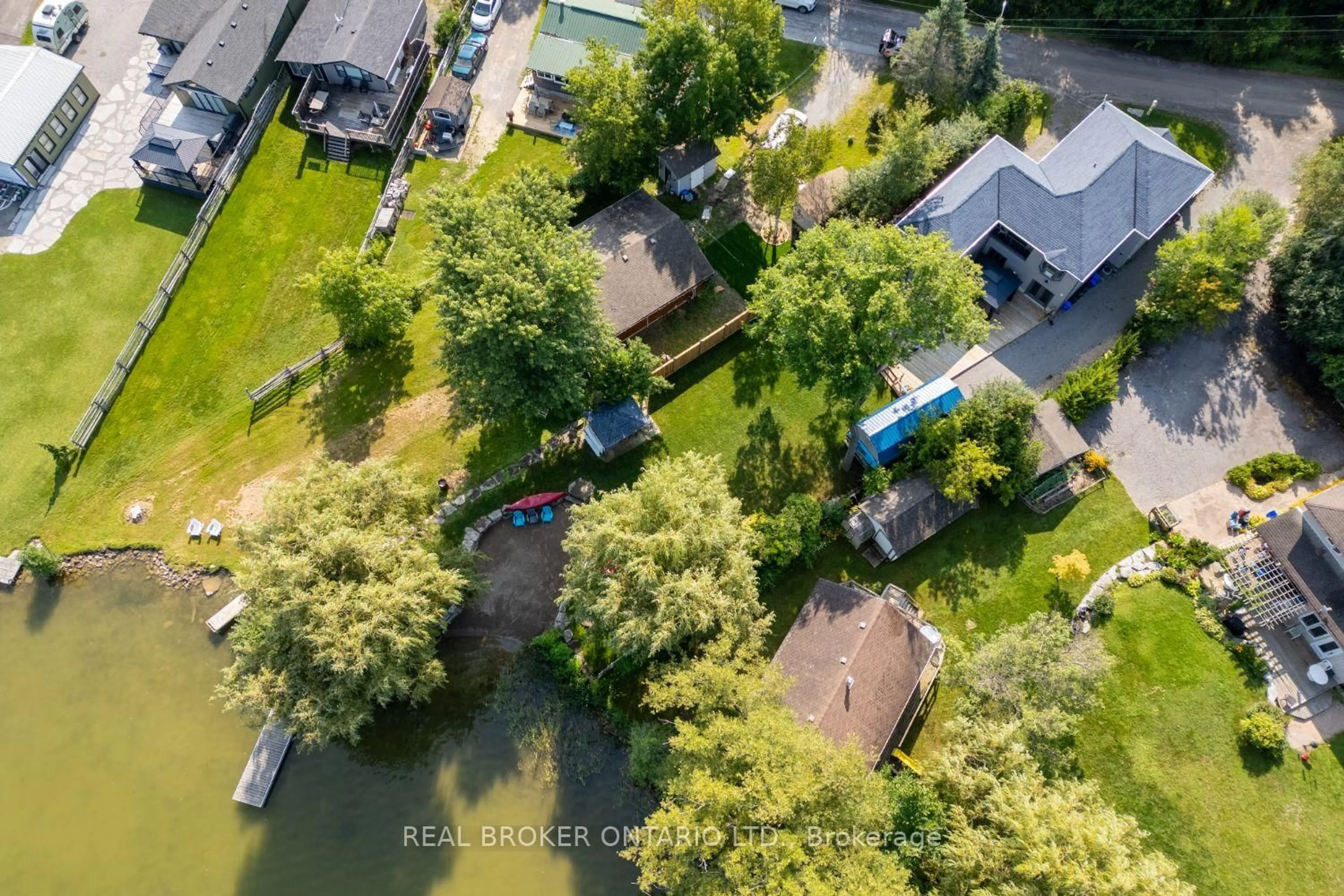 A pic from outside/outdoor area/front of a property/back of a property/a pic from drone, water/lake/river/ocean view for 526 View Lake Rd, Scugog Ontario L0B 1K0