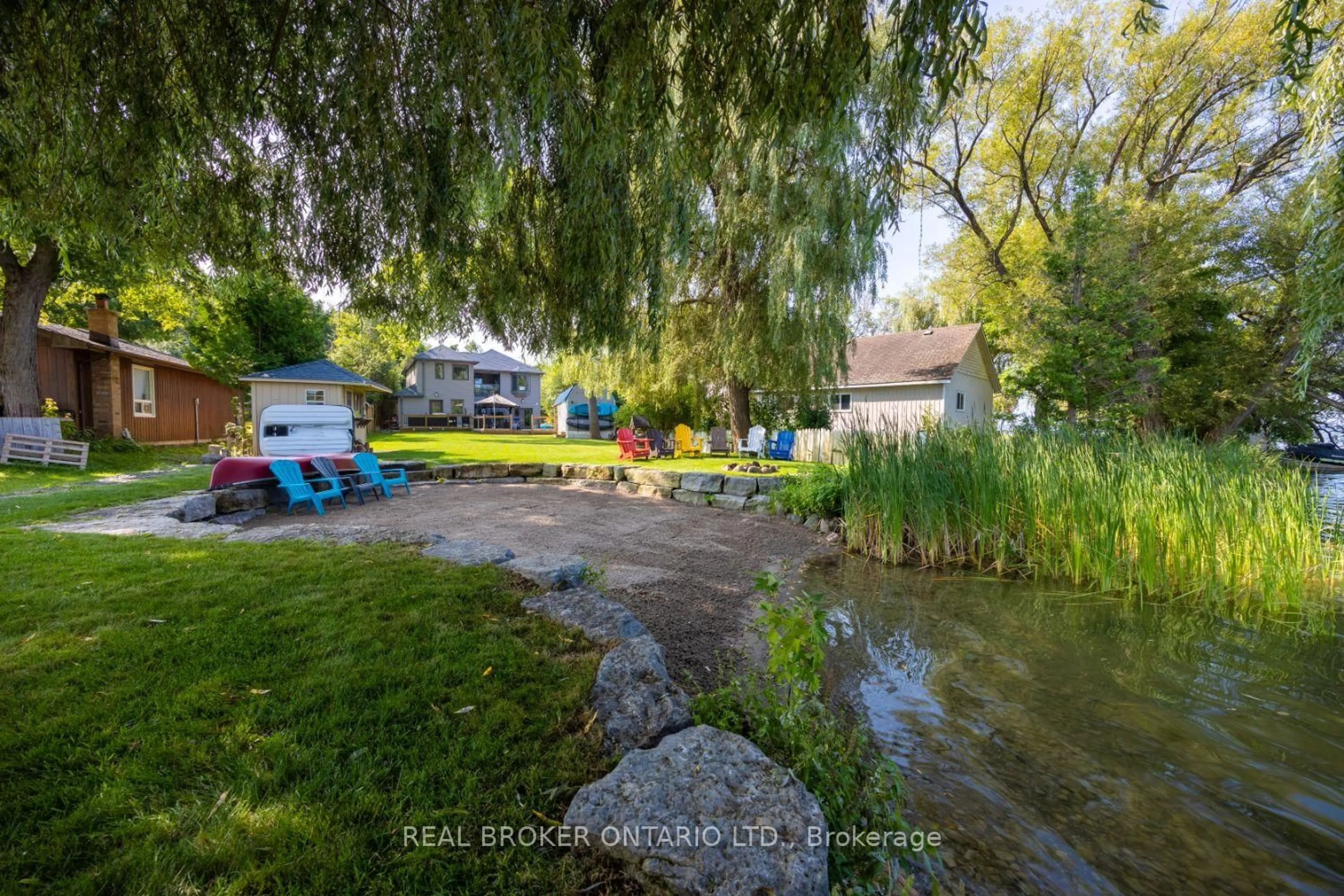 A pic from outside/outdoor area/front of a property/back of a property/a pic from drone, water/lake/river/ocean view for 526 View Lake Rd, Scugog Ontario L0B 1K0