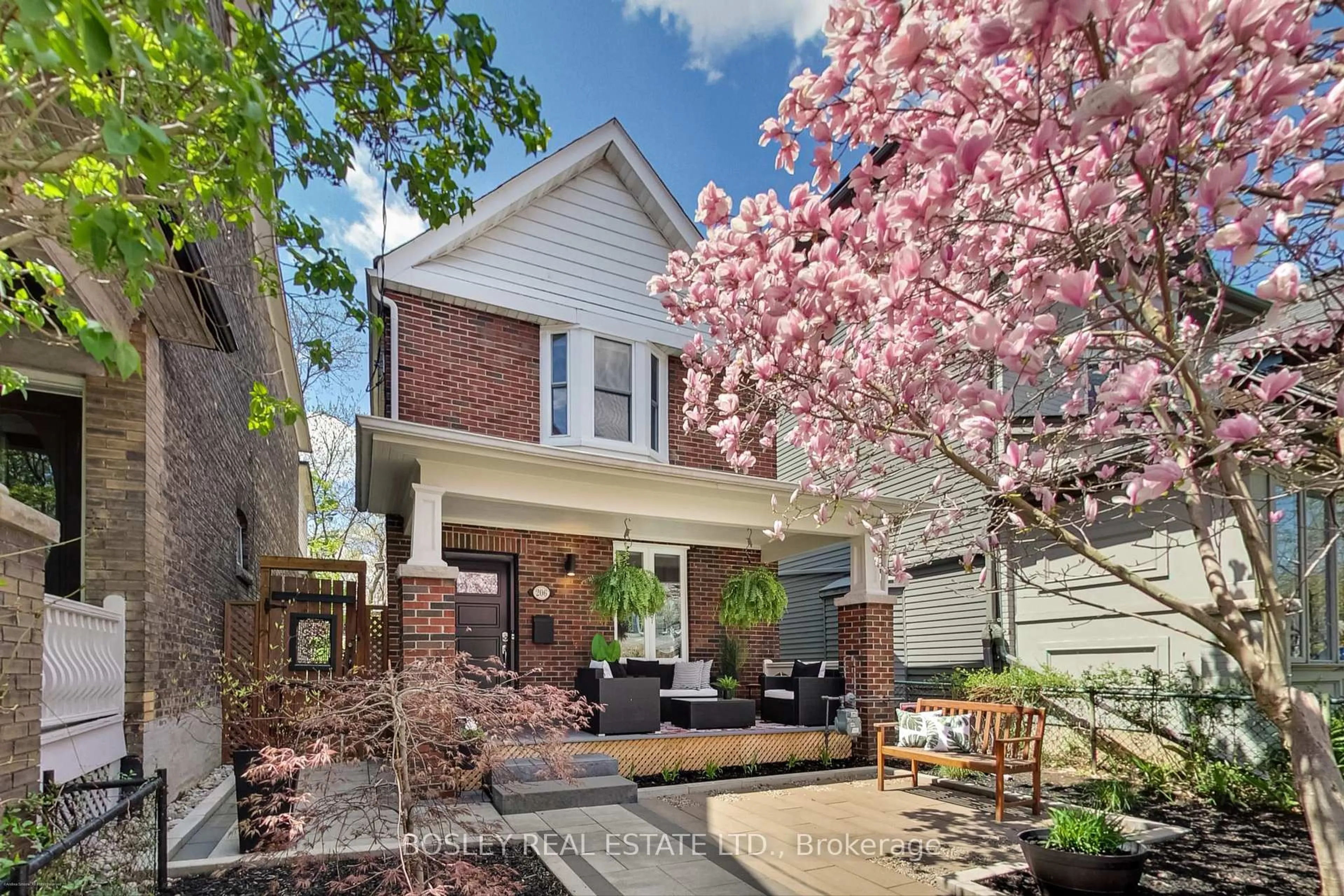 Home with brick exterior material, street for 206 Ashdale Ave, Toronto Ontario M4L 2Y9