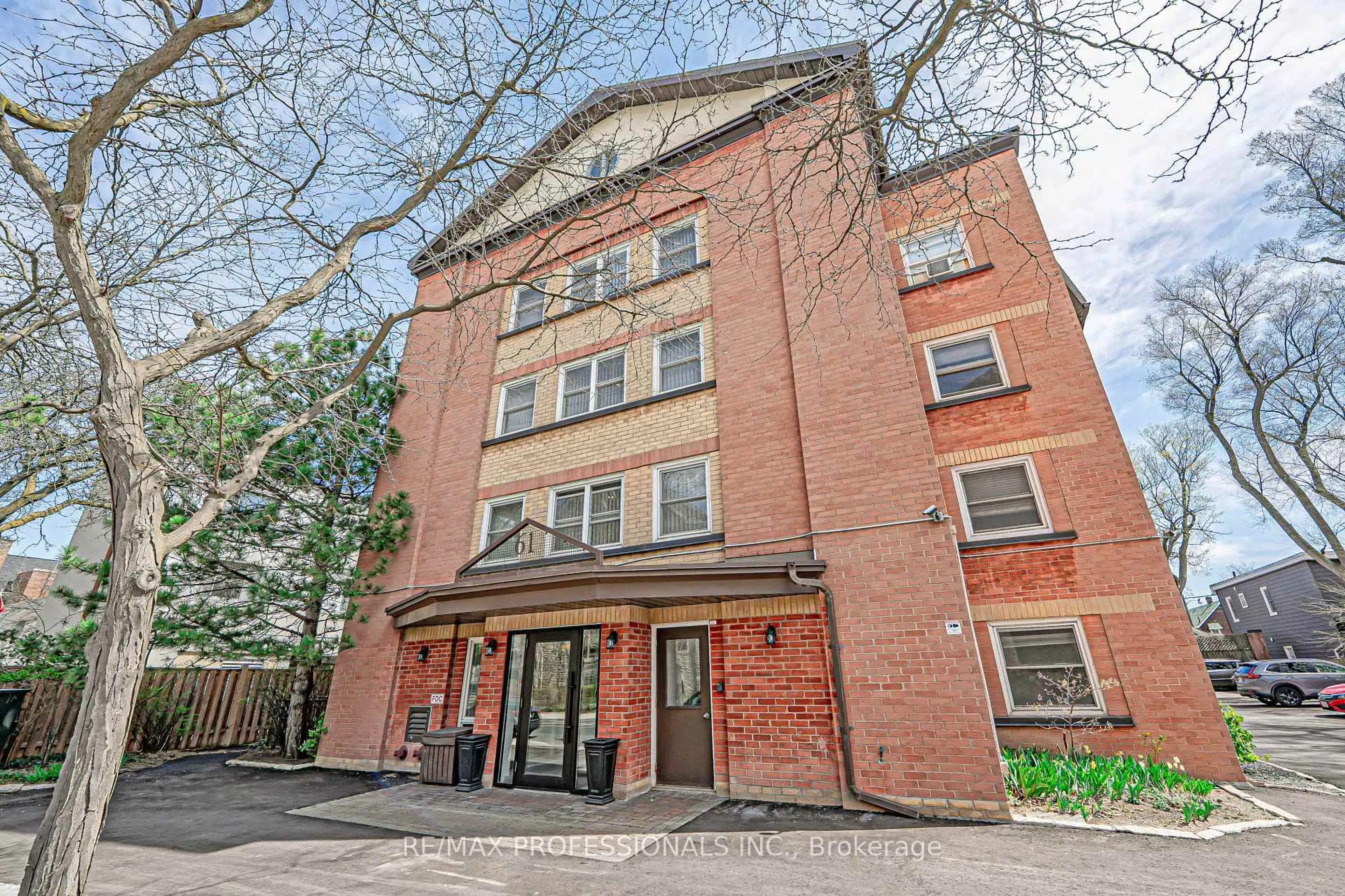 Home with brick exterior material, building for 61 Main St #202, Toronto Ontario M4E 2V6
