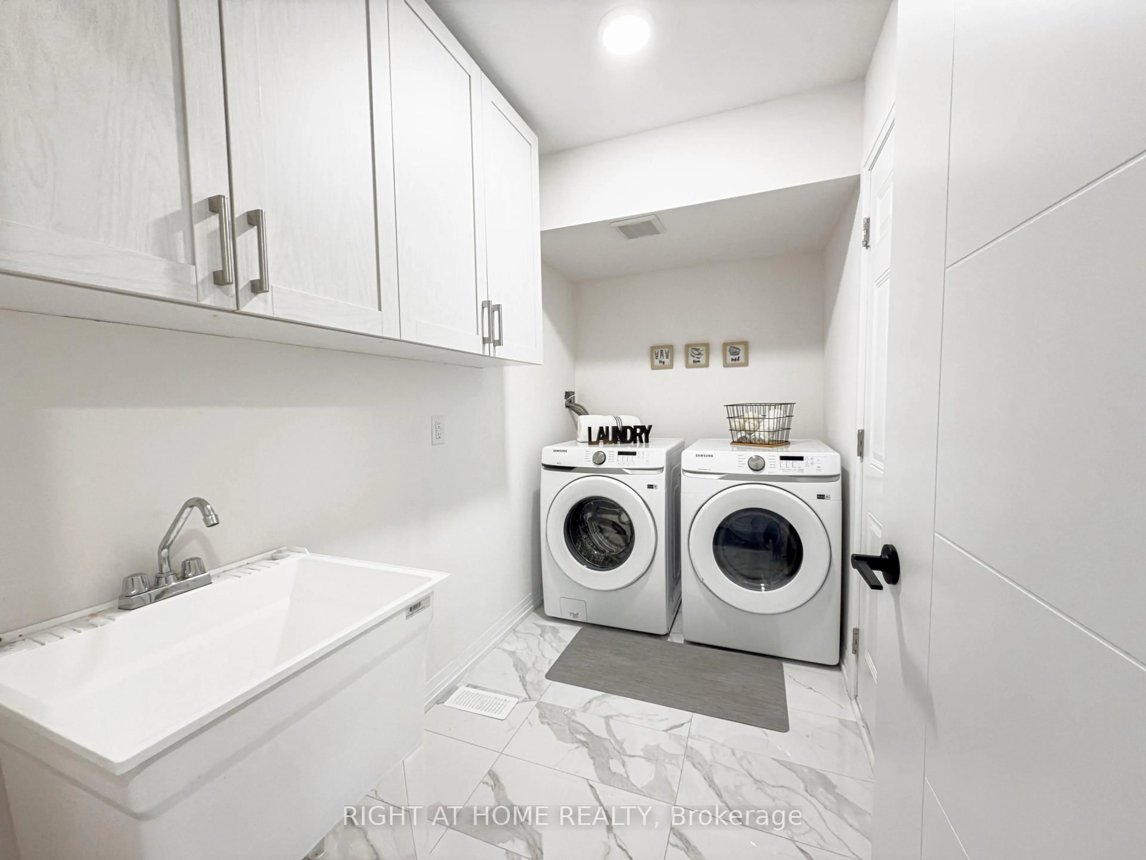 Laundry room for 31 Bavin St, Clarington Ontario L1C 7H5